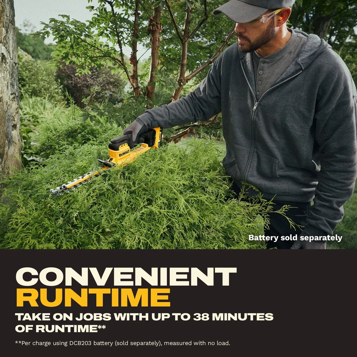 DeWALT DCHT823B 20V MAX 8-in. Cordless Compact Hedge Trimmer, Tool Only trimming dense shrub growth in a landscaped yard for detail hedge shaping