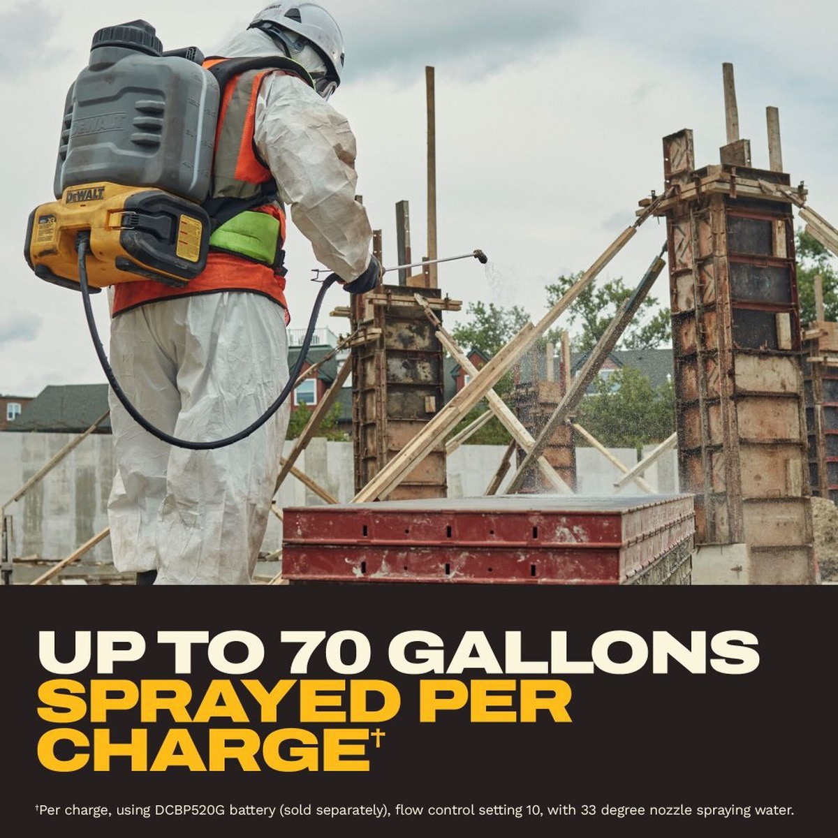DeWALT DCCS1100B 20V MAX XR Concrete Chemical Sprayer spraying concrete forms on a construction site while worn as a backpack sprayer