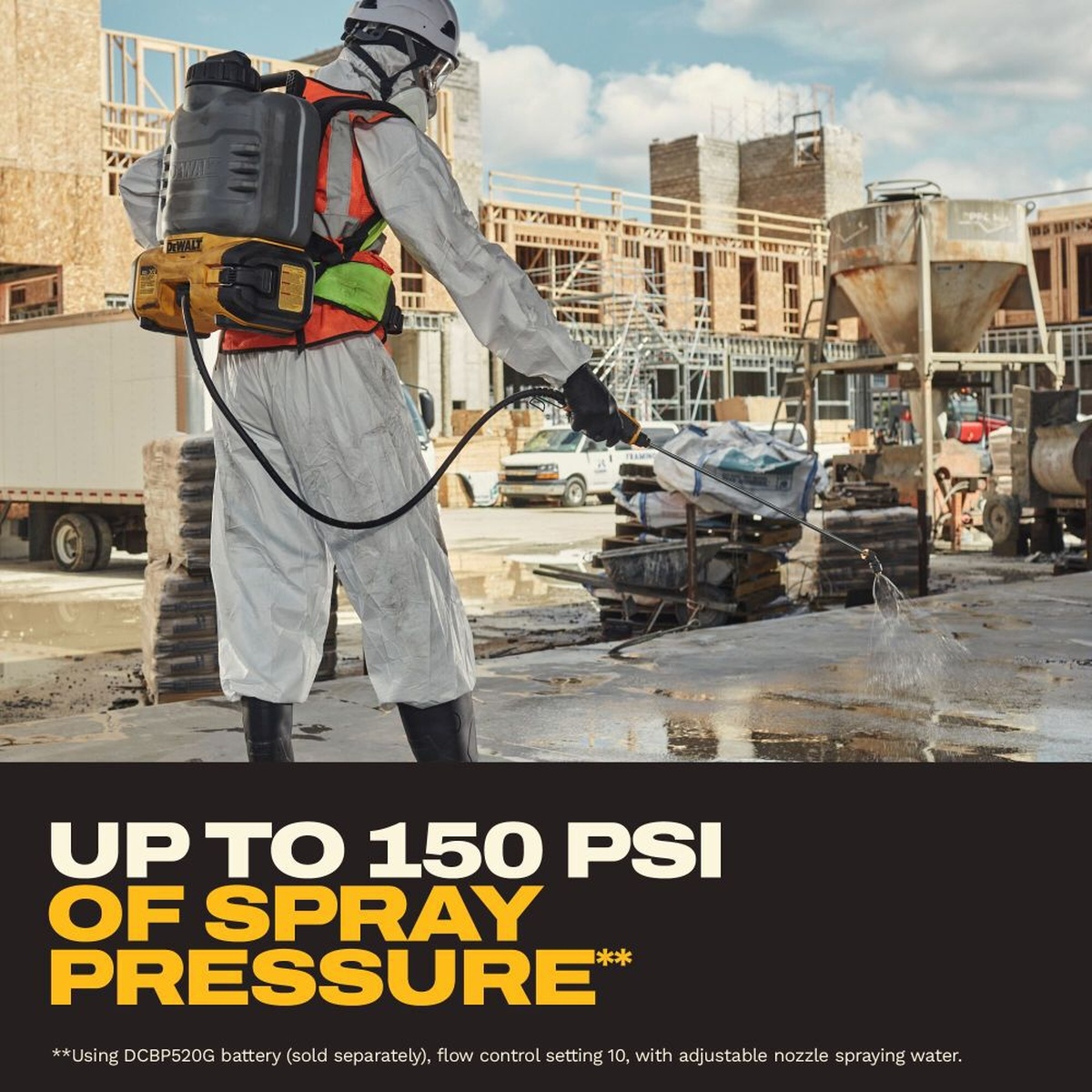 DeWALT DCCS1100B 20V MAX XR Concrete Chemical Sprayer in use on a construction site spraying across a concrete surface during concrete chemical application