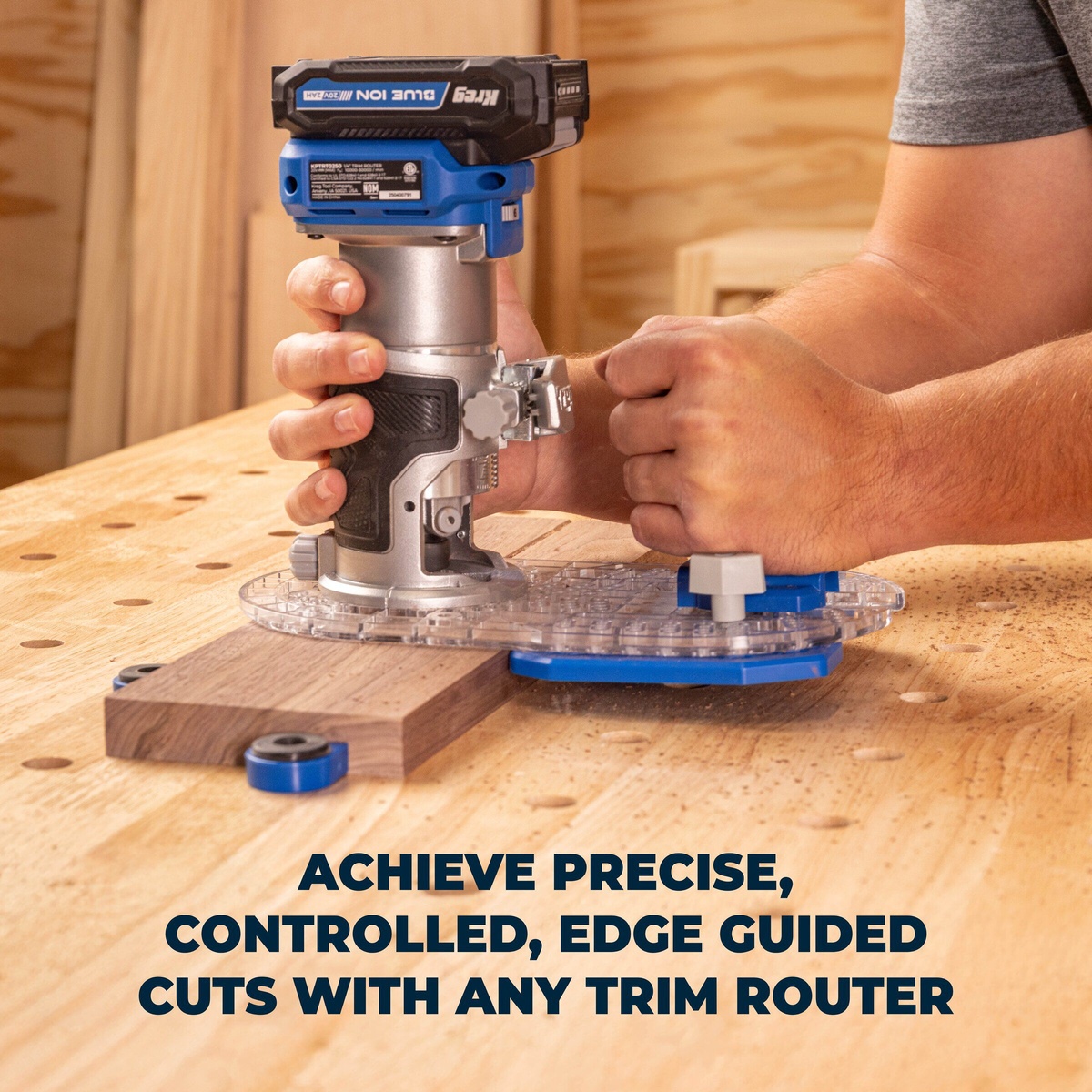 Kreg KRTBP150 Trim Router Edge Guide on a trim router set up on a wood bench for controlled guided routing and circle cutting pin use