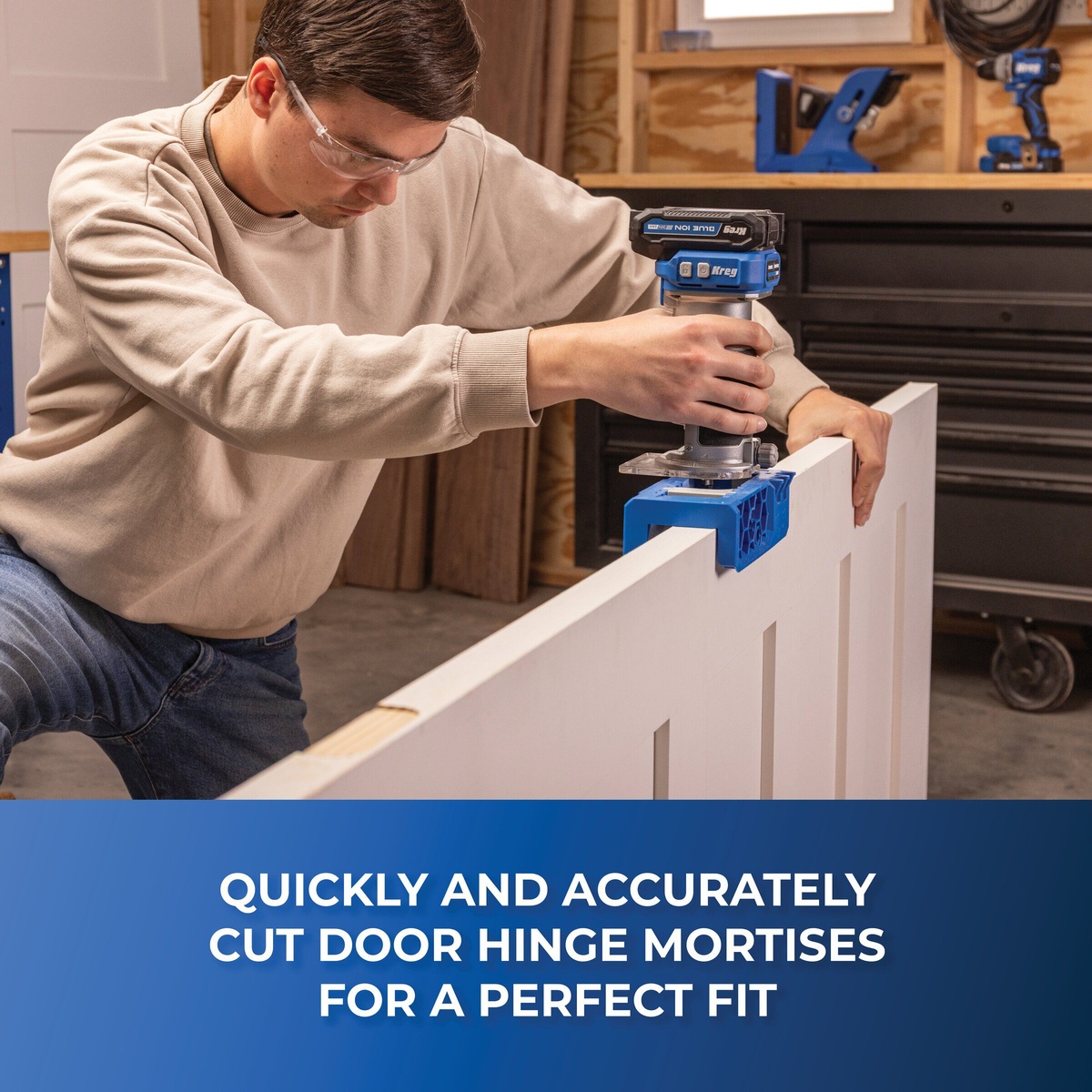 Kreg KRTHJ100 Door Hinge Routing Jig routing a hinge mortise on a door edge with a compact router in a workshop