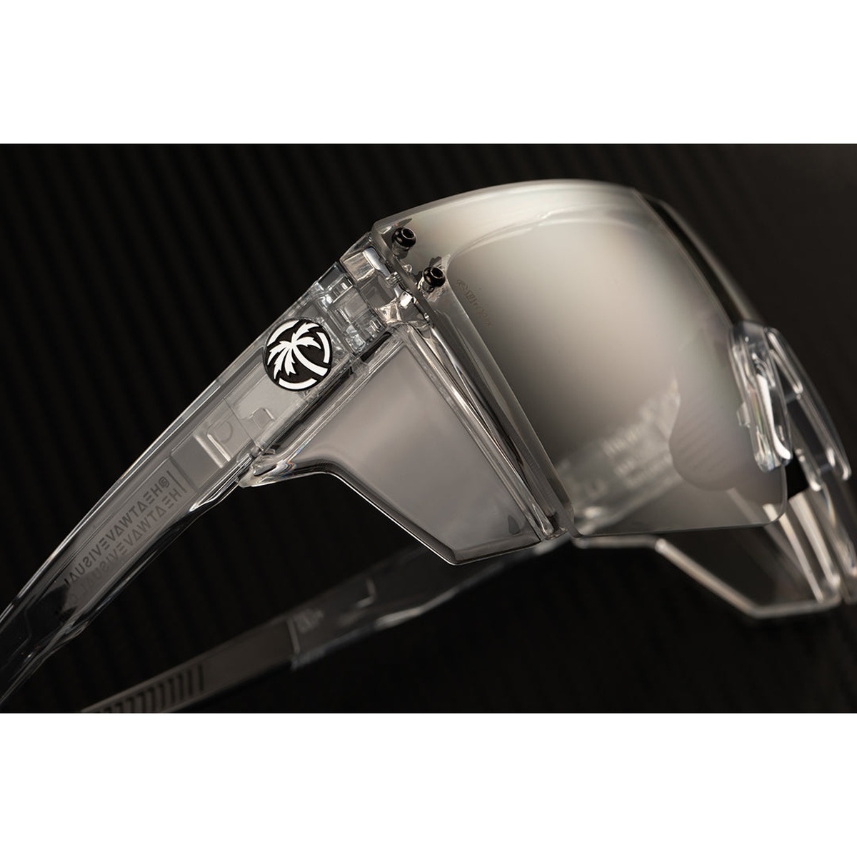 Close-up of Performance XL Lazer Face Sunglasses: Anti Fog Clear Lens Z87+ showing side shield connection and oversized frame details for debris protection