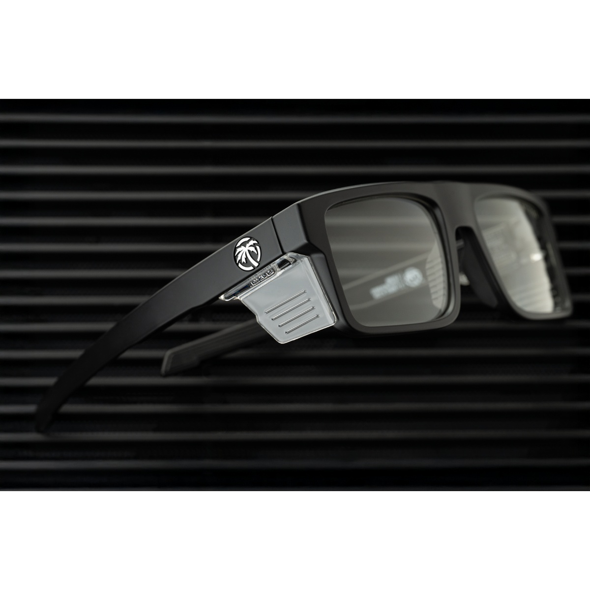 Heat Wave Visual Performance Rayth Sunglasses: Anti Fog Clear Lens Z87+ detail showing frame arm and removable side shield hardware