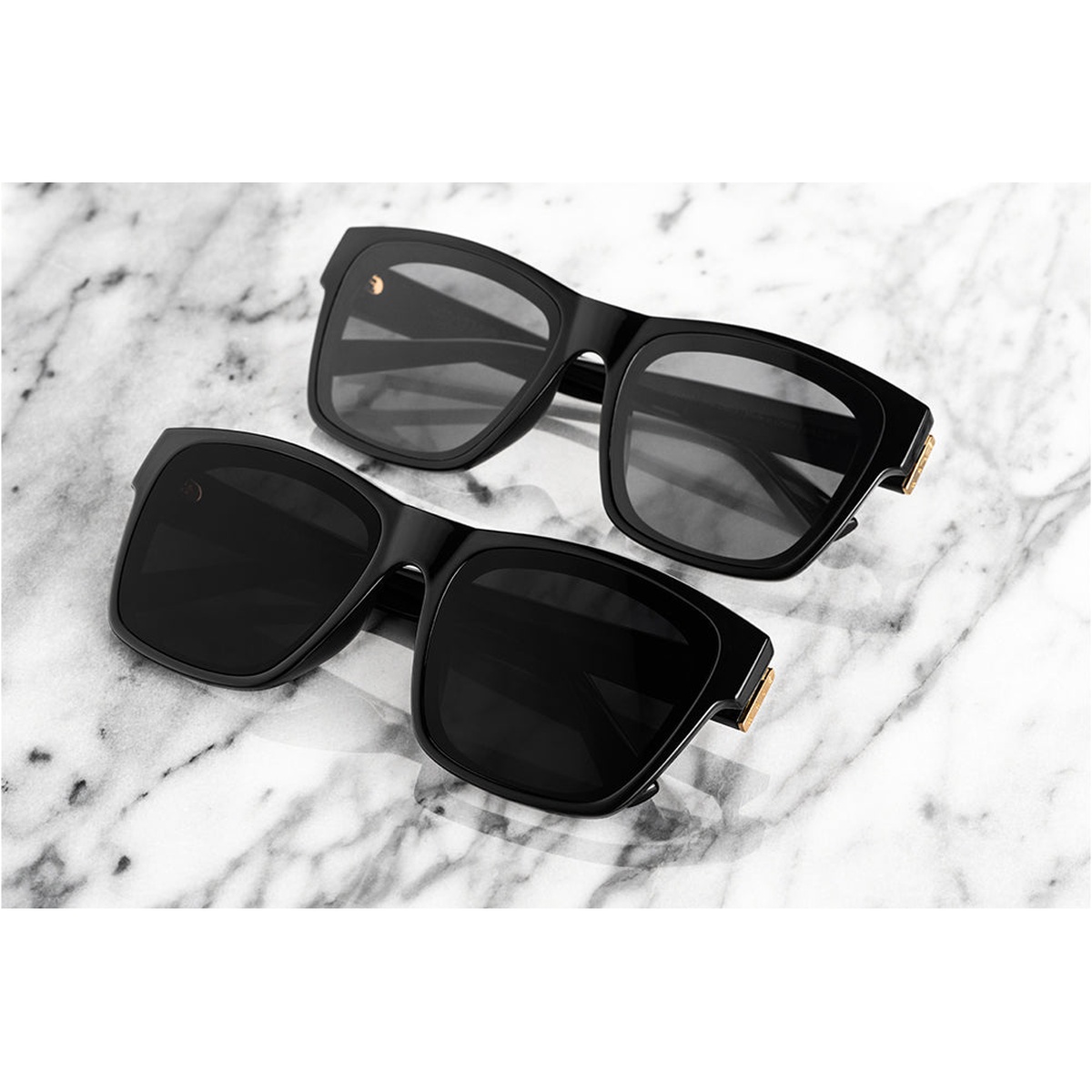 Heat Wave Visual Marylin Sunglasses Ultra Black showing thick black frame, flat flush mount lenses, and polished gold accents for everyday fashion eyewear