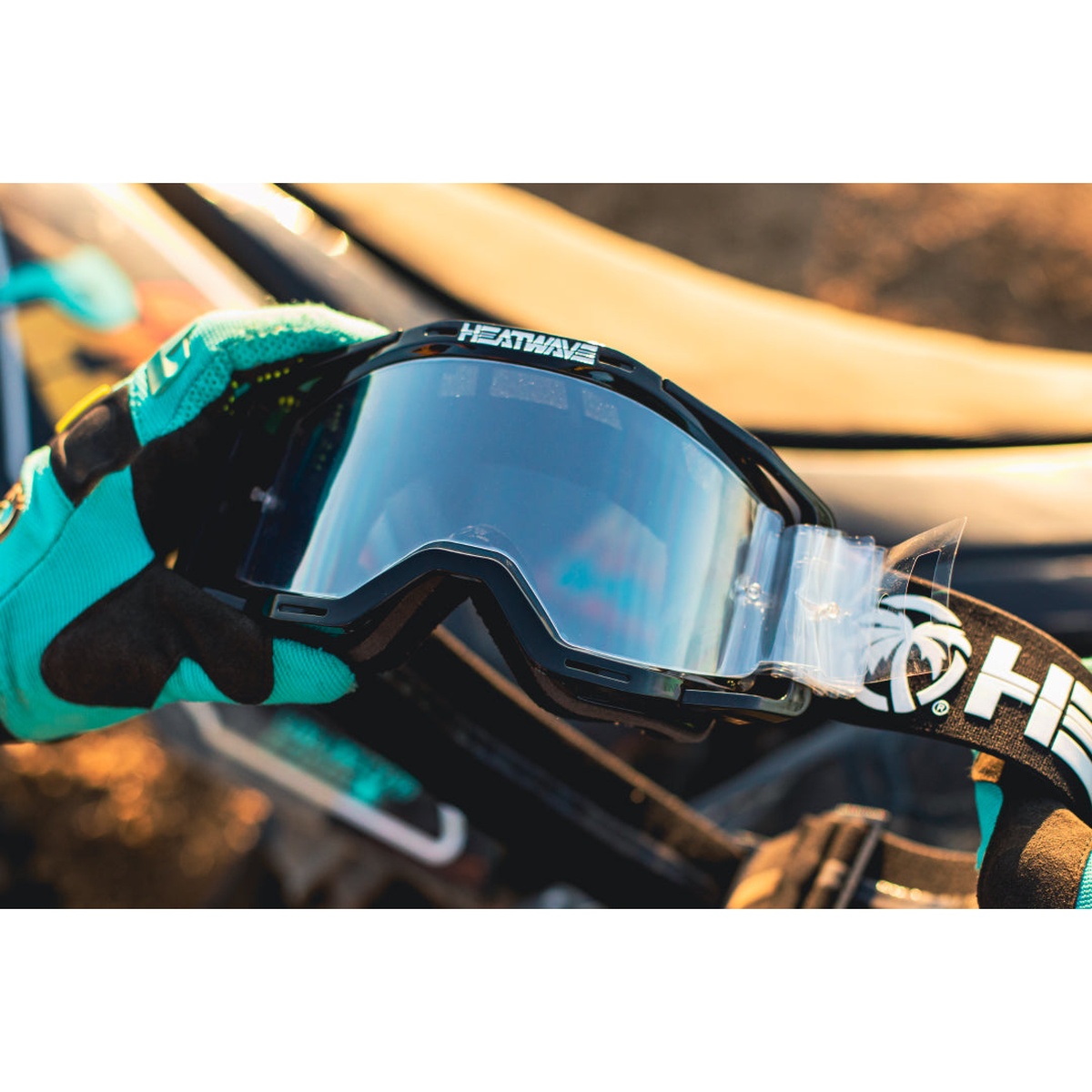 Heat Wave Visual MXG-250 Laminated Tear-Offs installed on MXG-250 goggles for off-road motorsports riding in dusty trail conditions