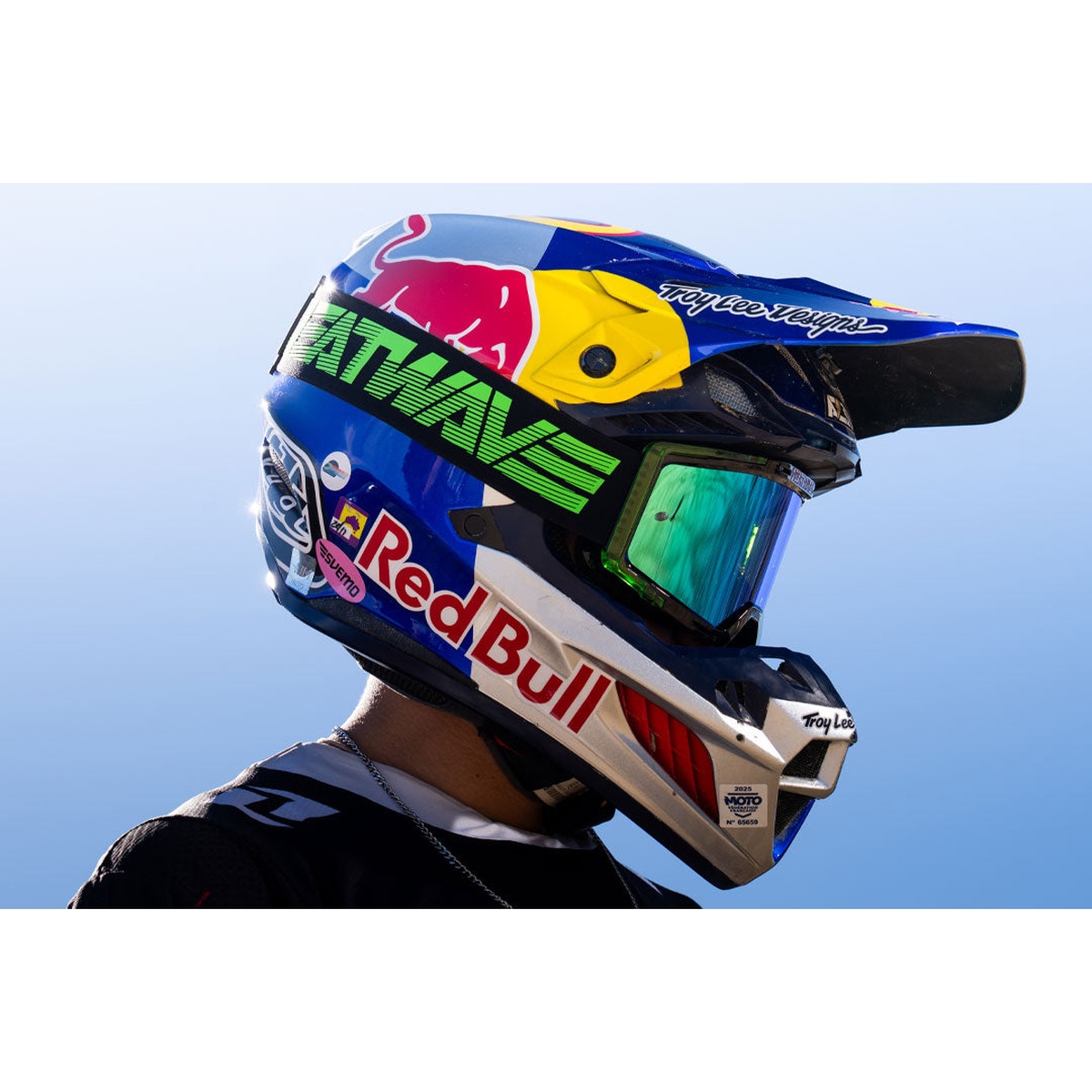 Heat Wave Visual MXG-250 Moto Goggle - Hydro Digger worn with a motocross helmet during outdoor riding in bright daylight