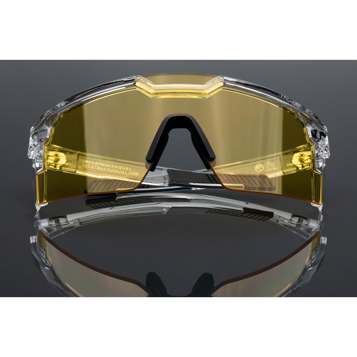 Heat Wave Visual Future Tech Sunglasses Vapor Clear Frame Hi-Vis Yellow Lens Z87+ close-up showing the high-visibility yellow lens for contrast and bright viewing in indoor or overcast work conditions