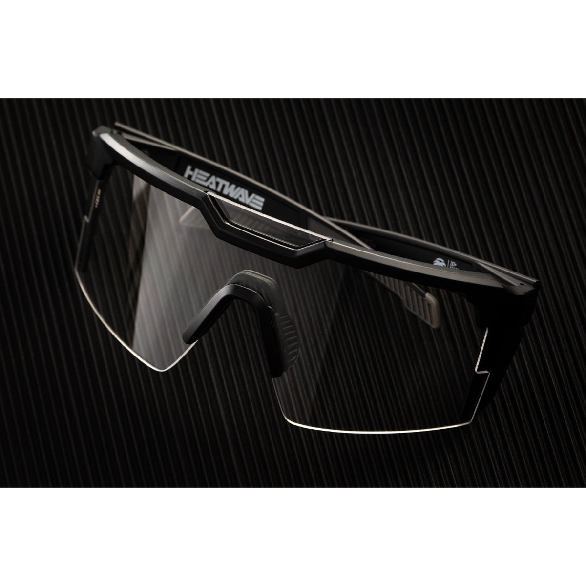 Heat Wave Visual Future Tech Sunglasses: Black Frame Clear Lens Z87+ showing full shield clear polycarbonate lens and wraparound frame for indoor and low-light use