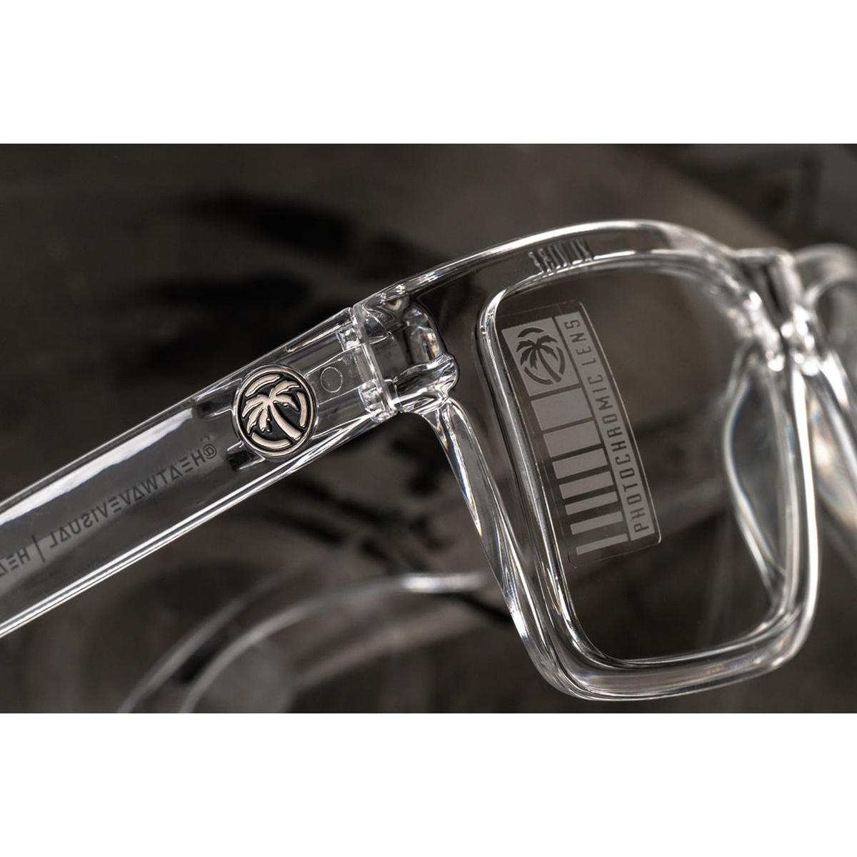 Close view of Heat Wave Visual VISE Z87 Sunglasses VAPOR CLEAR Frame Photochromic Lens showing frame and lens details for shop and jobsite protection