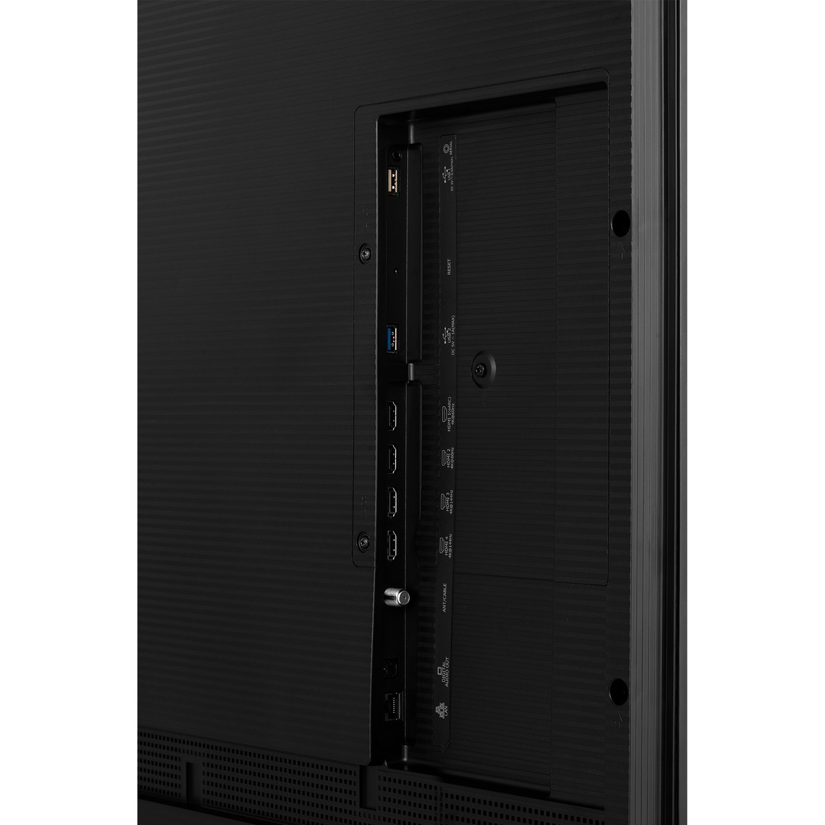 Close-up of the rear connection bay showing multiple HDMI and USB ports on the Hisense TV.