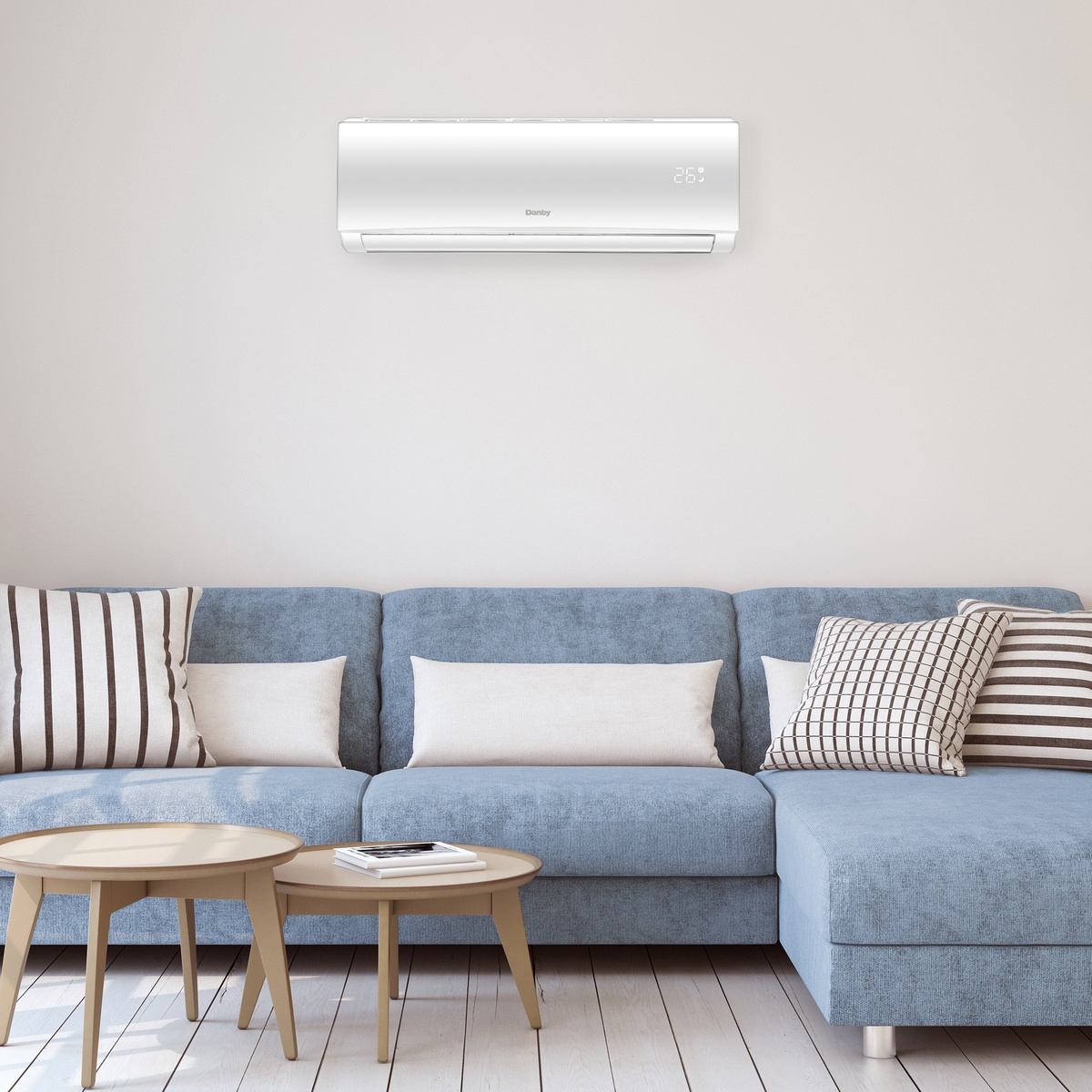 Indoor wall-mounted unit in a modern living room above a sofa