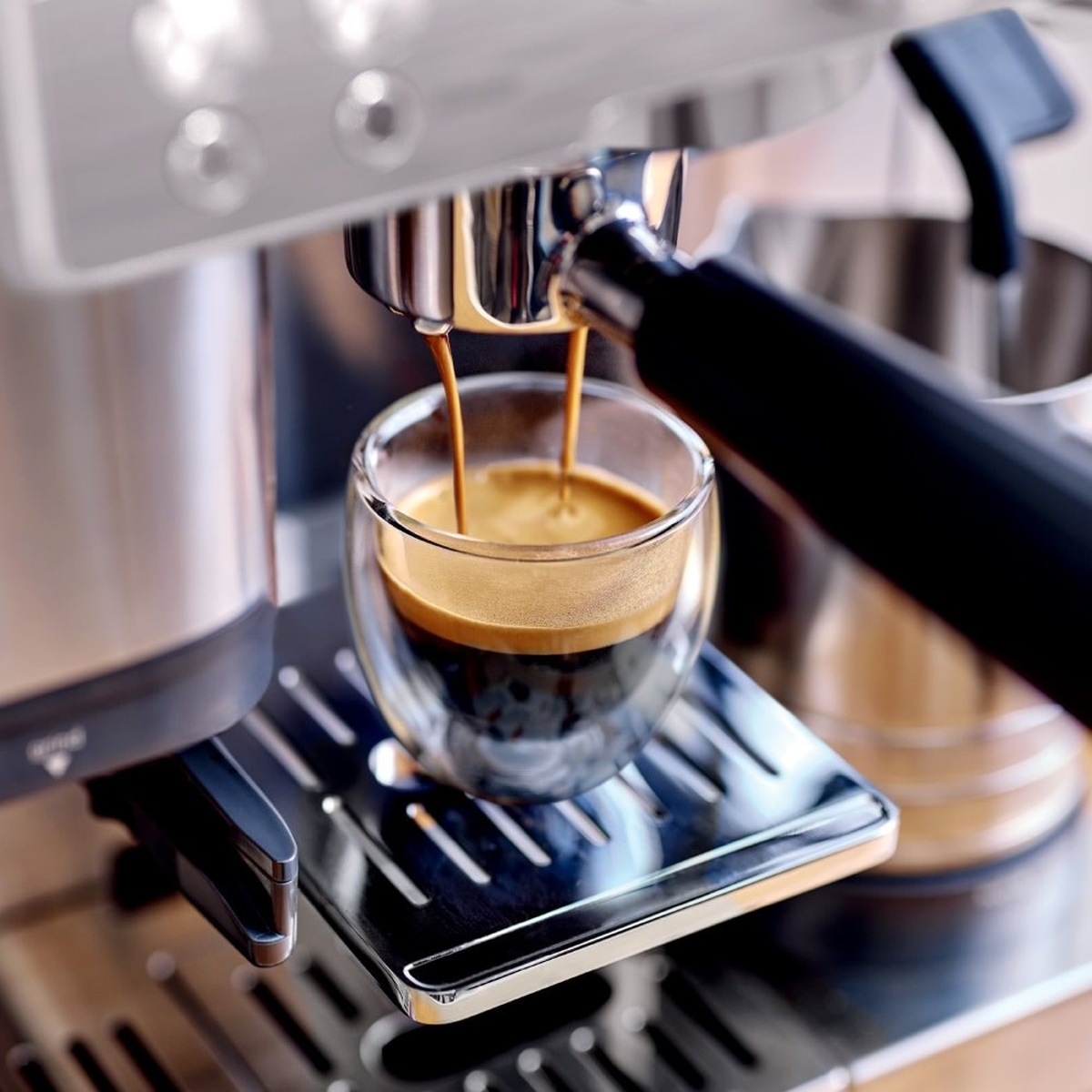 Close-up of espresso pouring with rich crema from the Ninja ES601C portafilter
