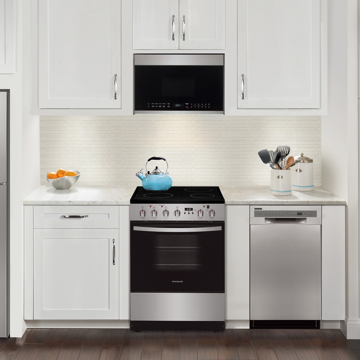 24-inch Frigidaire range installed between cabinets in a modern kitchen
