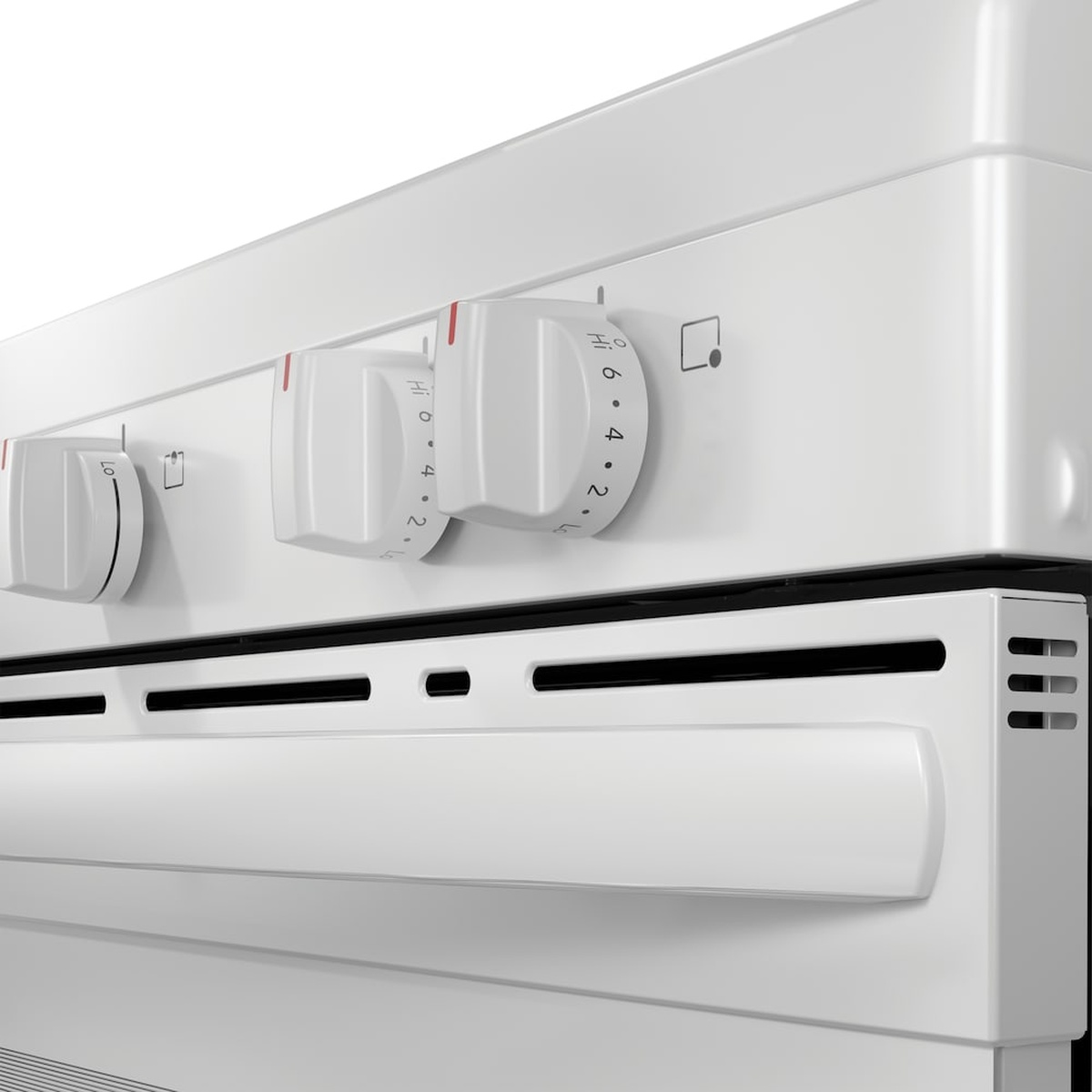 Close-up of front control knobs on the Frigidaire range.