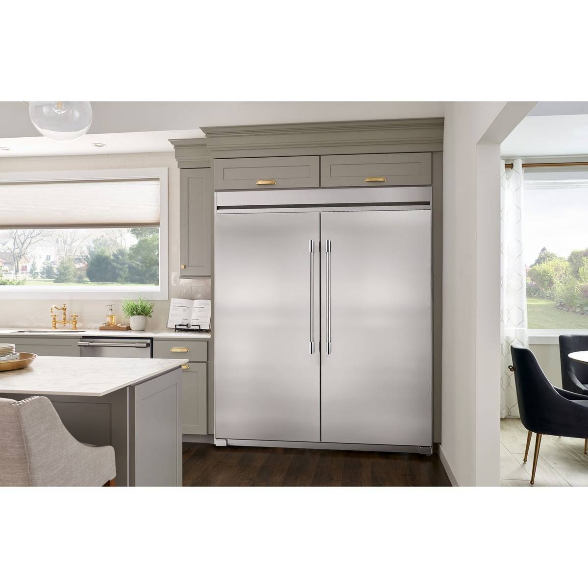 Freezer paired with matching refrigerator creating a built-in look in a modern kitchen