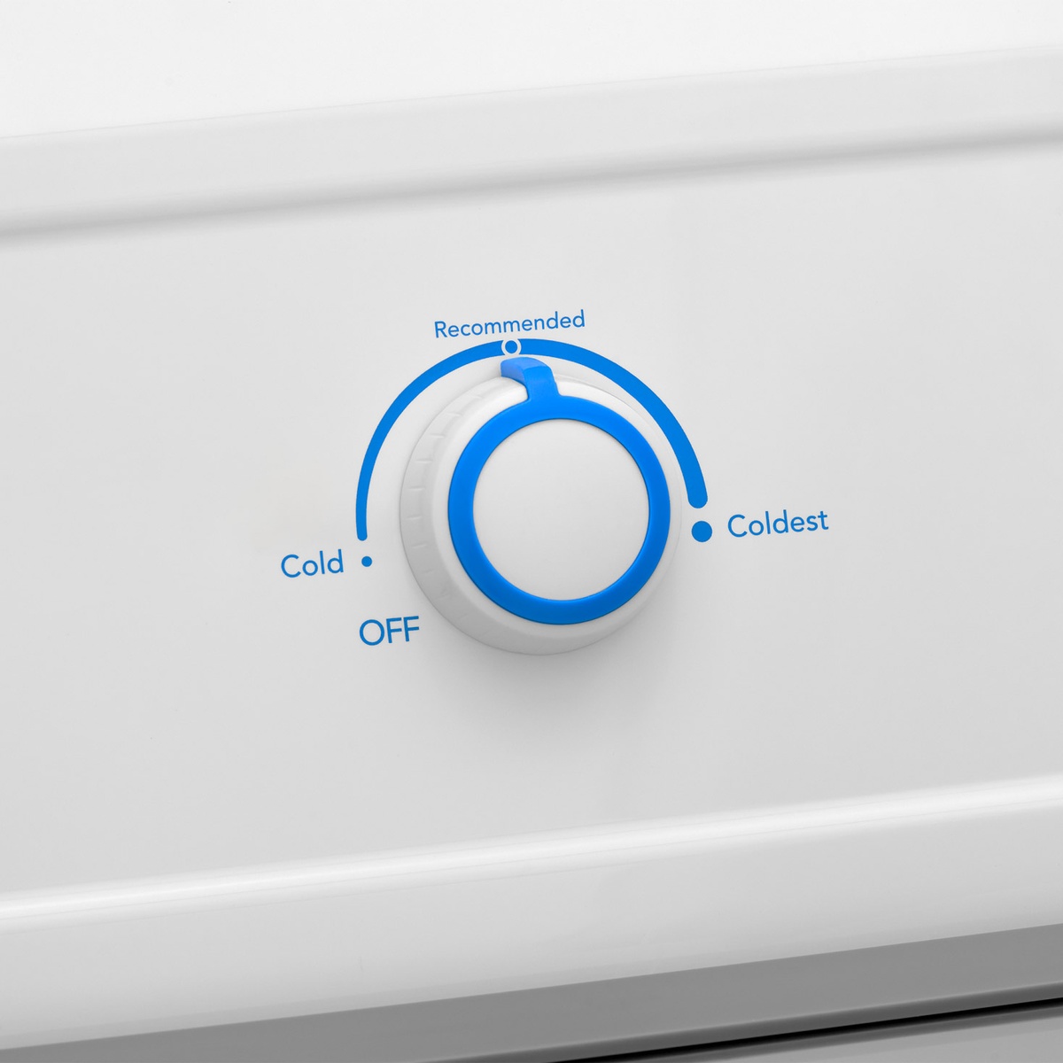 Close-up of the freezer's blue-ring temperature dial with clear Cold to Coldest markings.