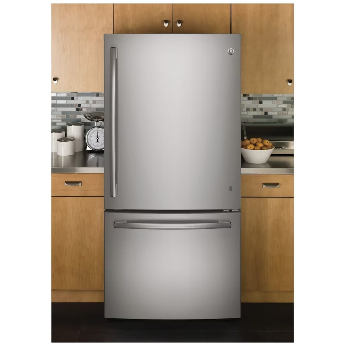 Stainless steel refrigerator installed in a modern kitchen