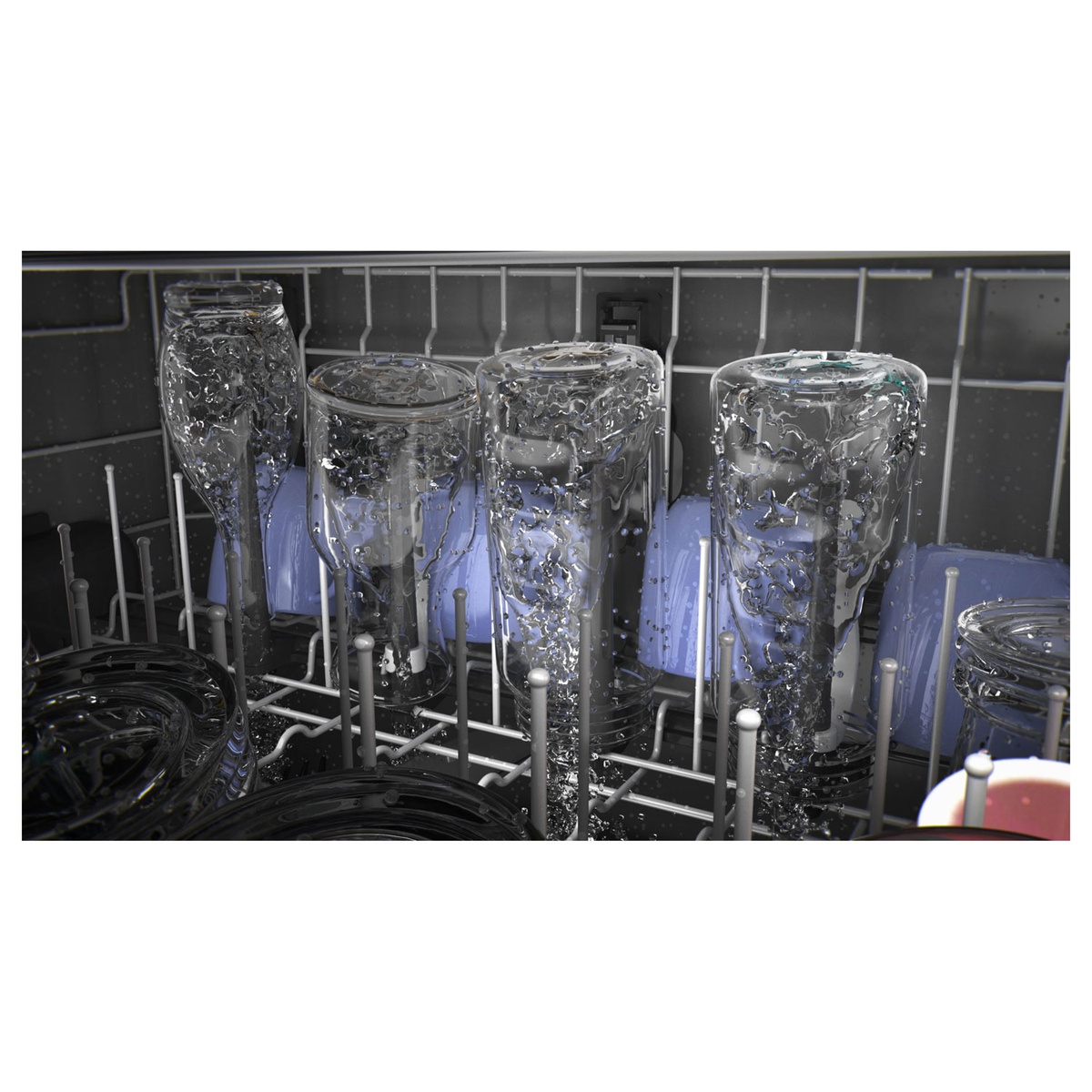 Upper rack bottle jets spraying inside tall glasses.