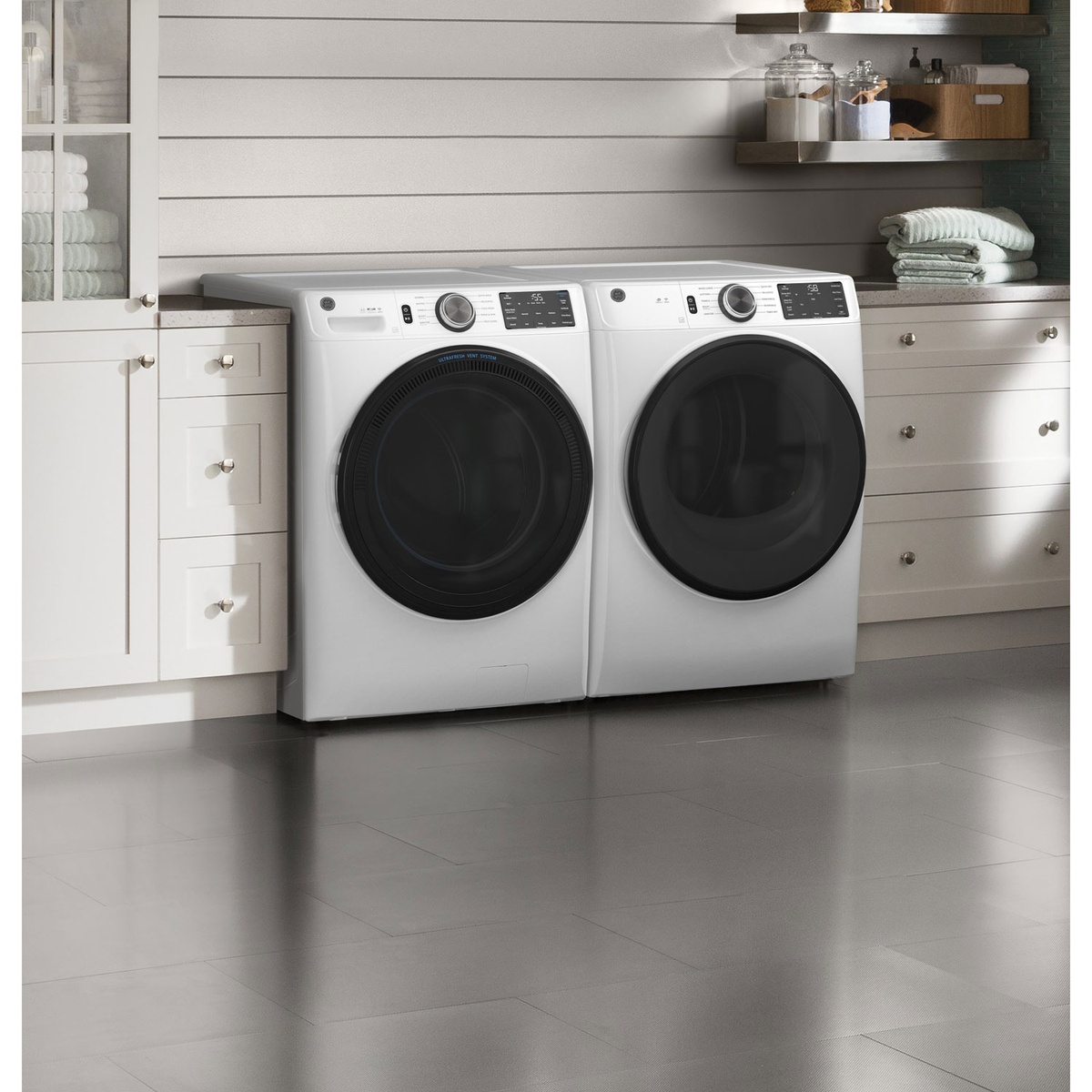 Washer and dryer side by side in a modern laundry room