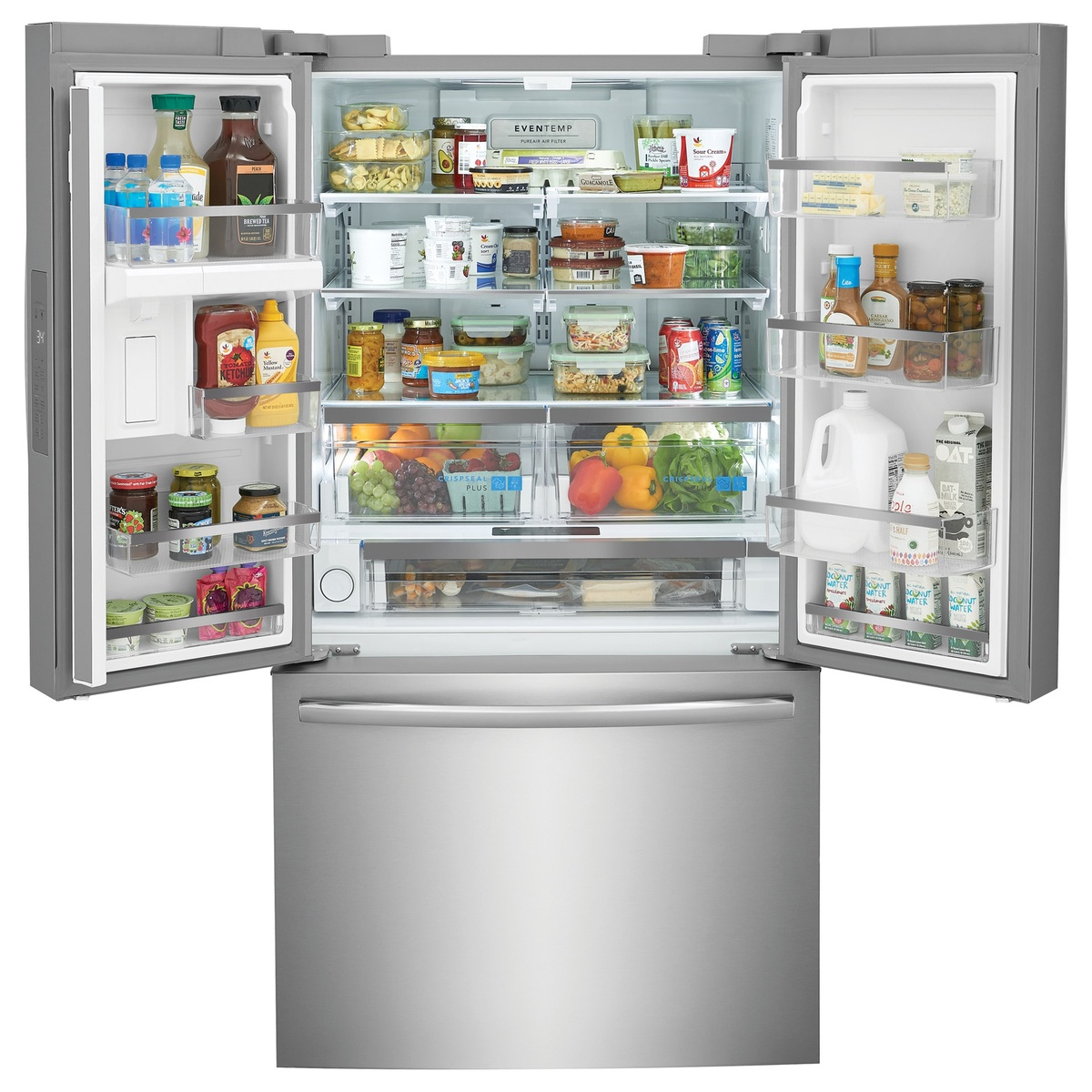 Refrigerator interior fully stocked showing wide shelves, door bins, and CrispSeal Plus drawers