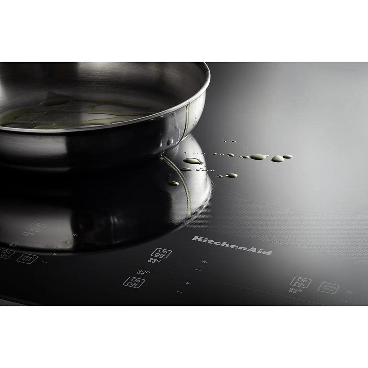 Touch-activated control panel with pan and easy-wipe glass surface
