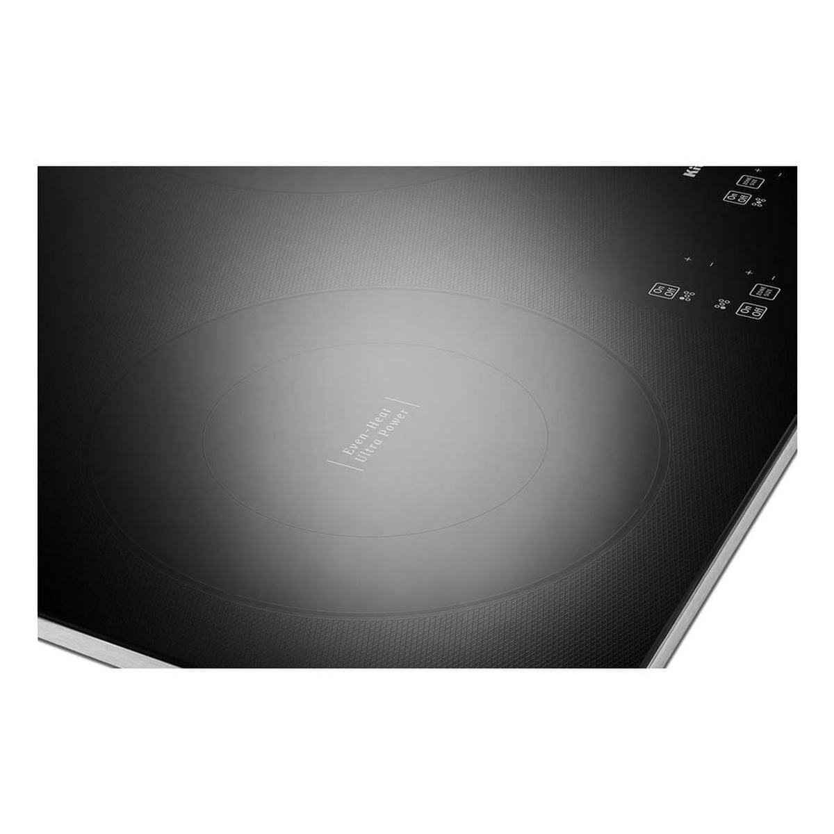 Detail of dual-ring element labeled Even-Heat Ultra Power on the cooktop surface