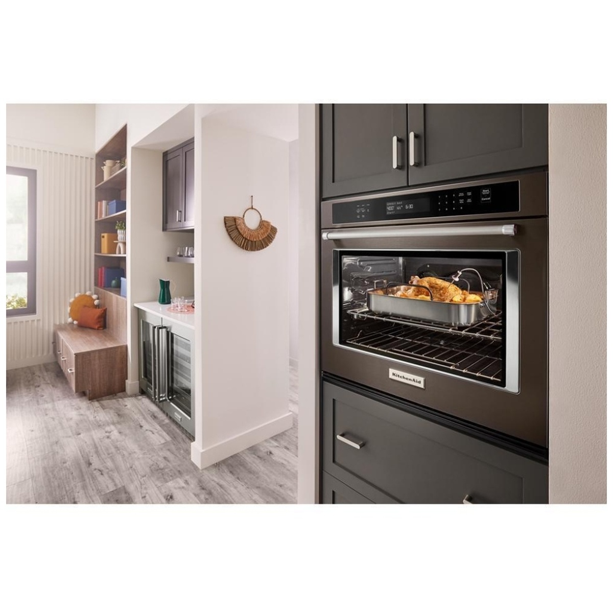 Roast cooking in the oven with a meat thermometer probe inserted