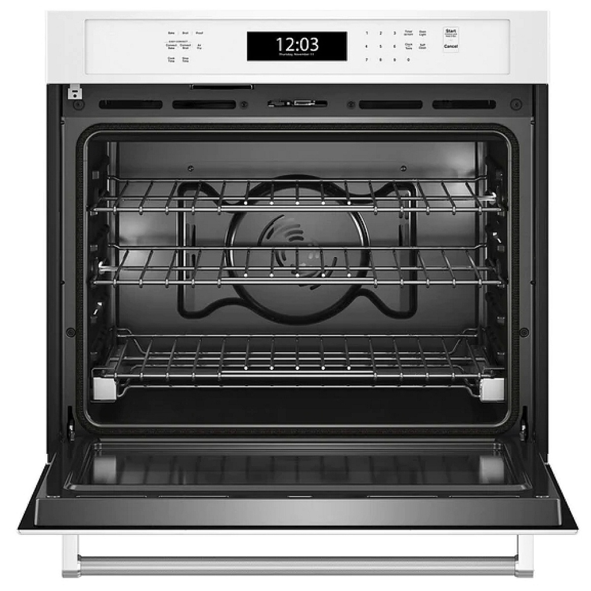 Open oven showing three racks and a convection fan at the back.