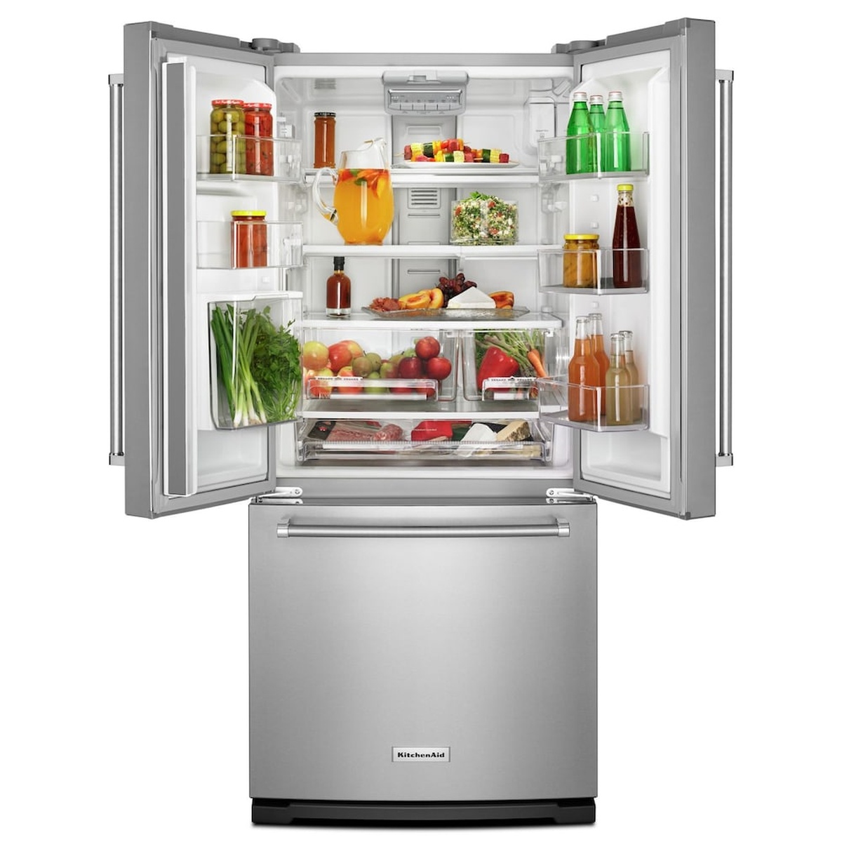 KitchenAid French door refrigerator stocked with food showing wide shelving and crispers