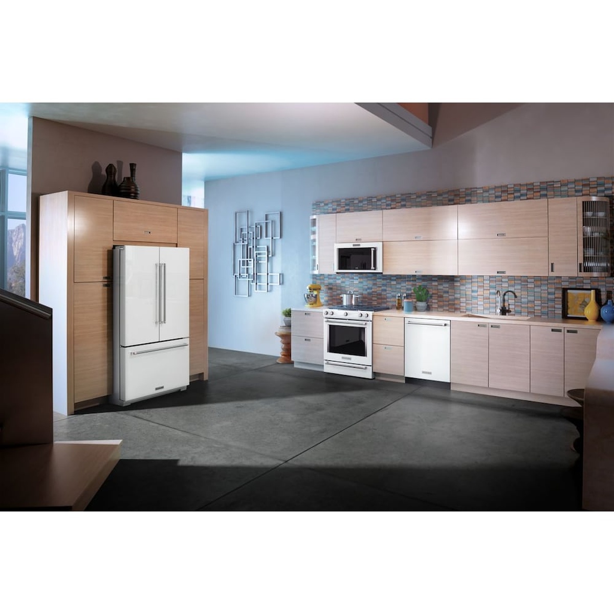 White KitchenAid French door refrigerator installed in a modern kitchen