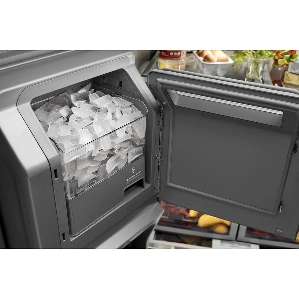 In‑door ice system with removable ice bin filled with ice