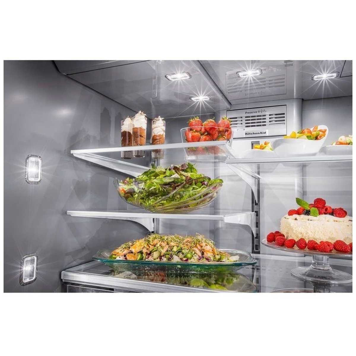 LED-lit platinum interior with glass shelves and desserts