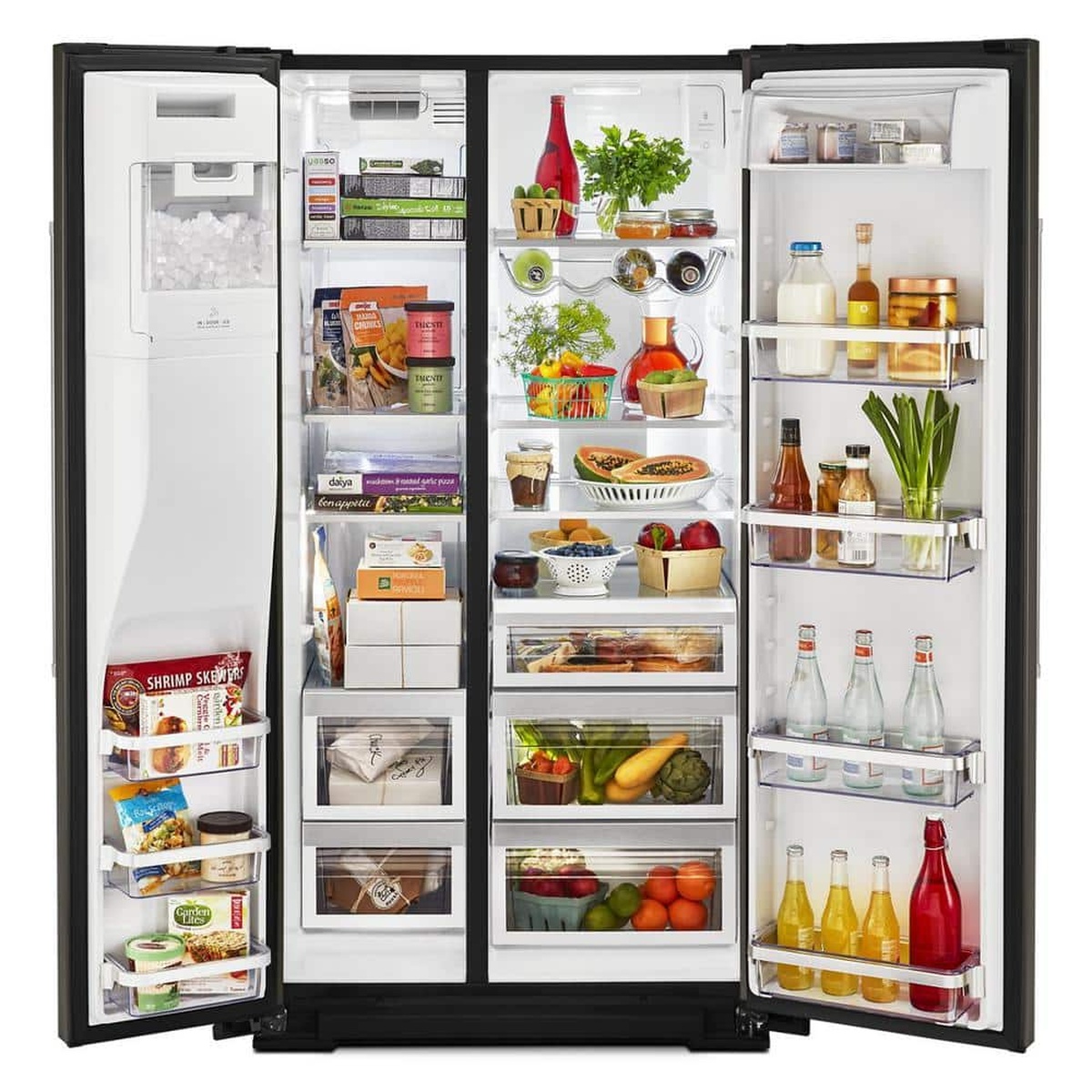 Open KitchenAid side-by-side refrigerator with in-door ice bin, shelves, drawers, and door bins