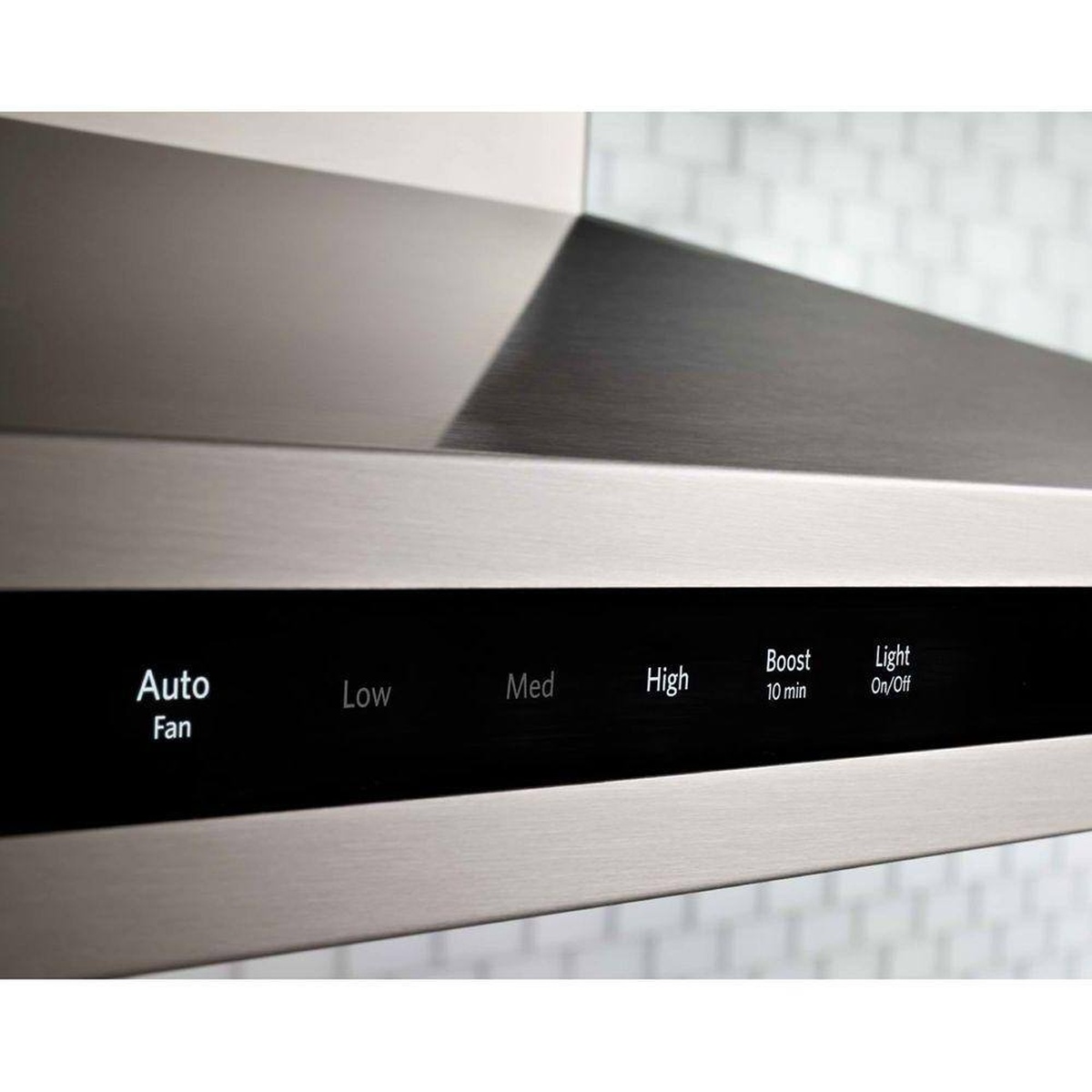 Close-up of KitchenAid KVIB606DSS touch controls showing Auto, Low, Med, High and Boost.