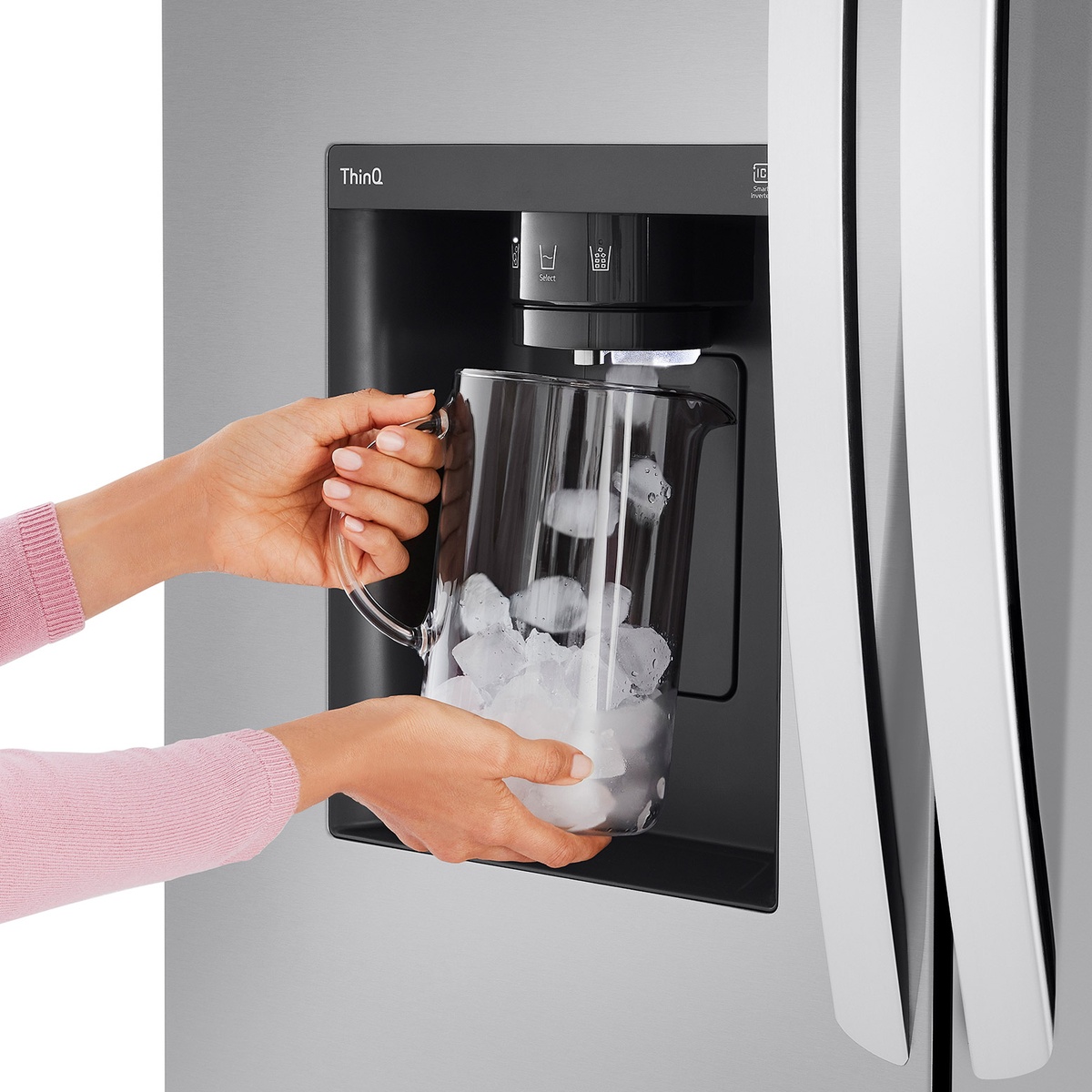 Close‑up of LG ThinQ ice and water dispenser filling a pitcher with ice