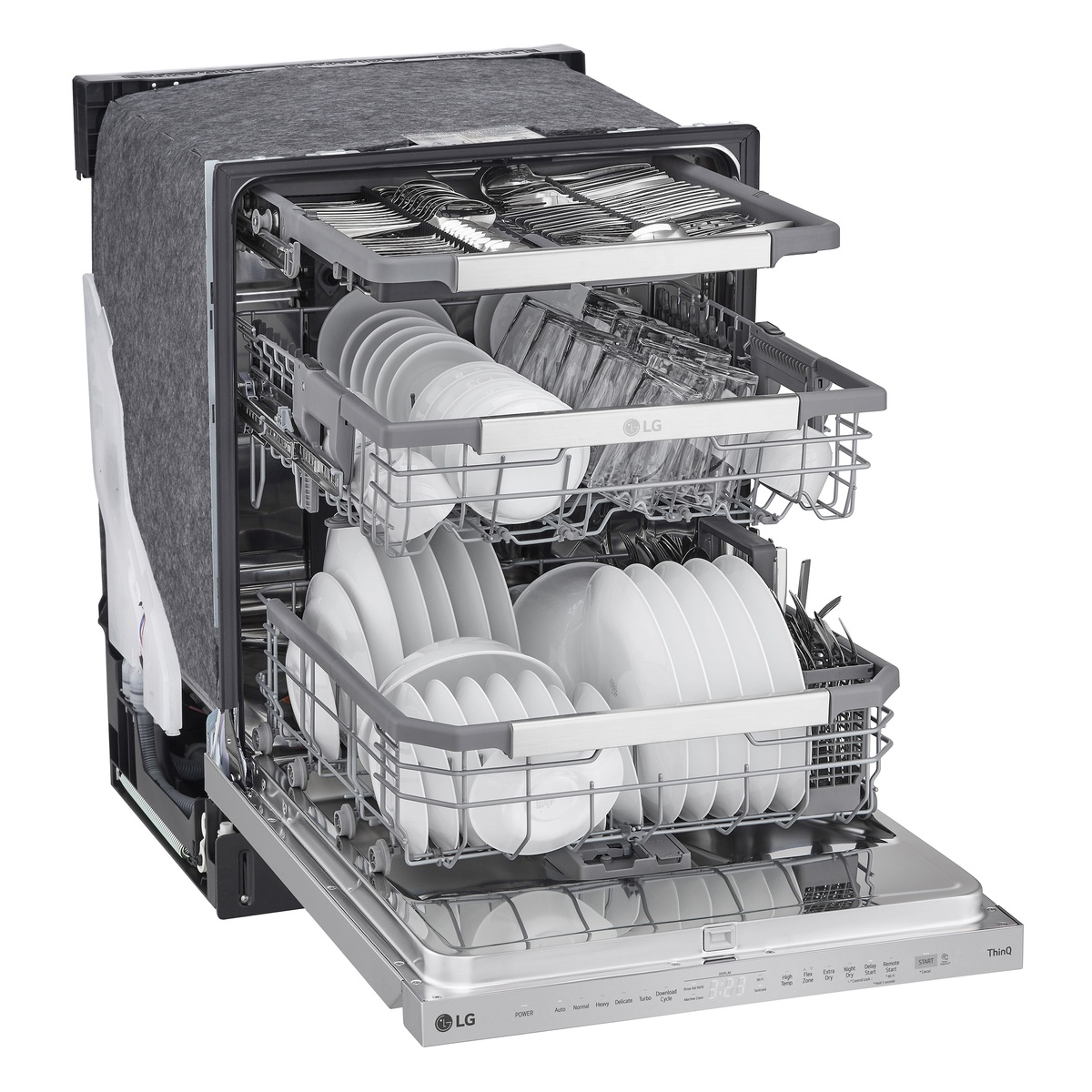 Dishwasher loaded with plates, glasses, and utensils across all racks