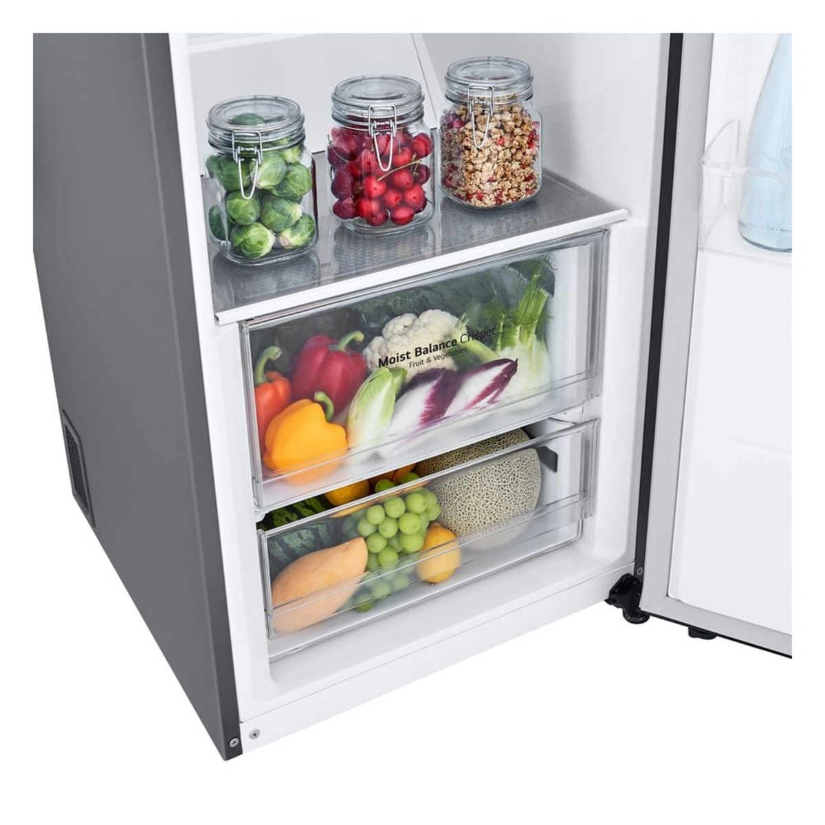 Close-up of Moist Balance Crisper drawers filled with fresh vegetables and fruit