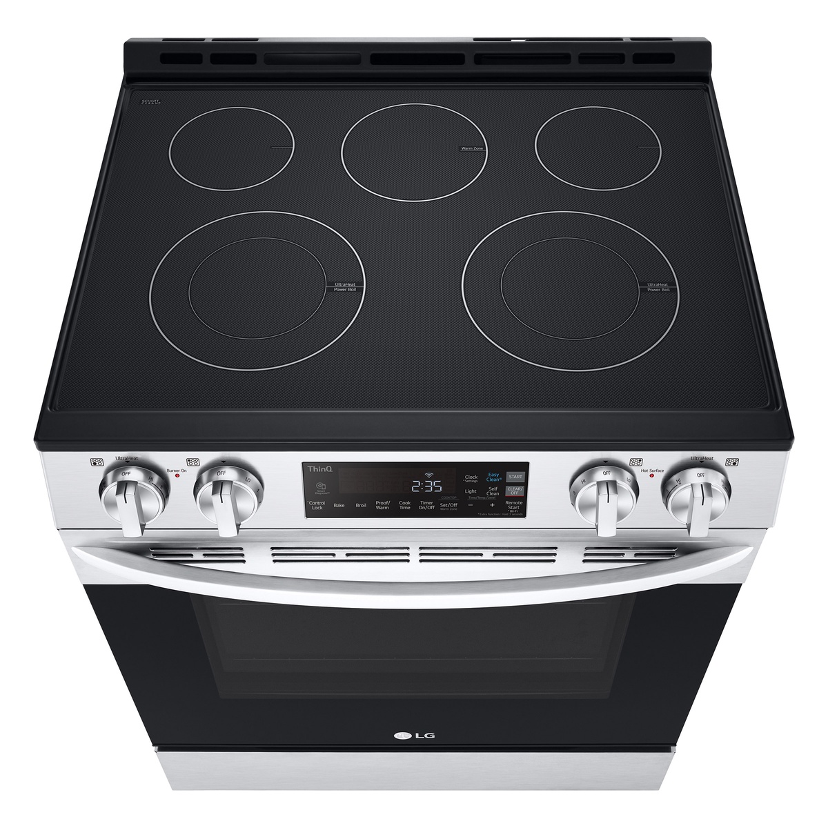 Glass cooktop with five radiant elements including dual-size zones and warming area.