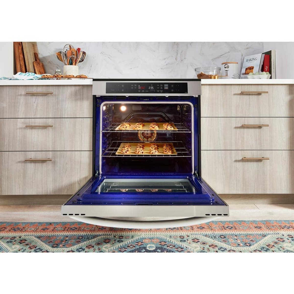 Cookies baking on two racks inside the LG oven