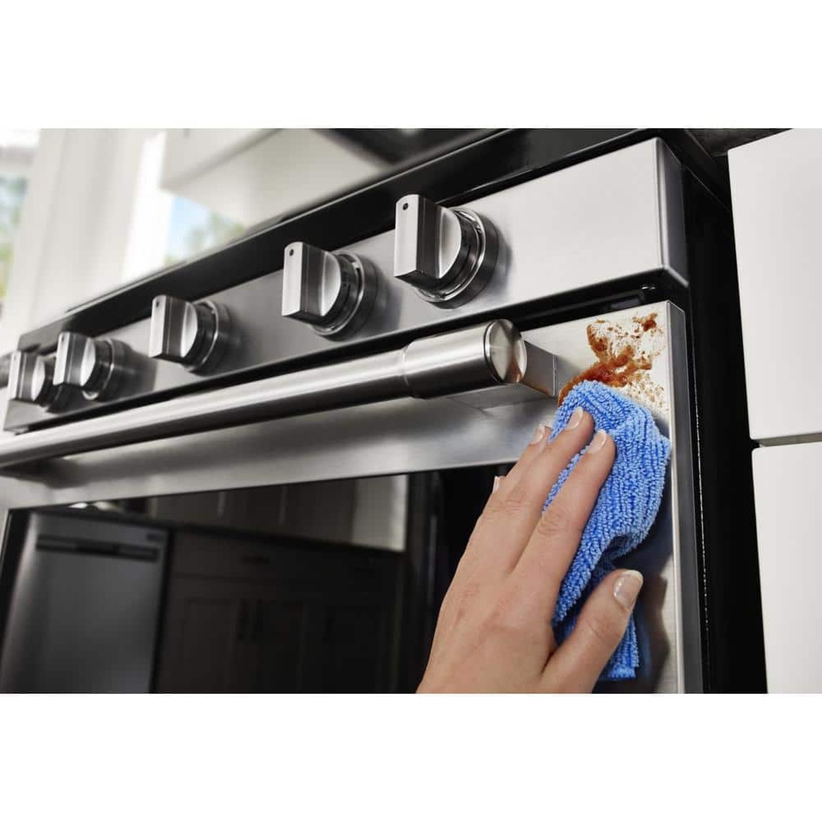 Hand wiping fingerprint-resistant stainless exterior clean