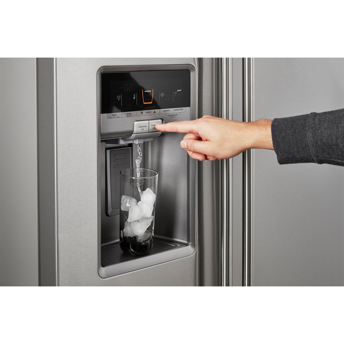 Close-up of the external dispenser with digital controls dispensing water over ice