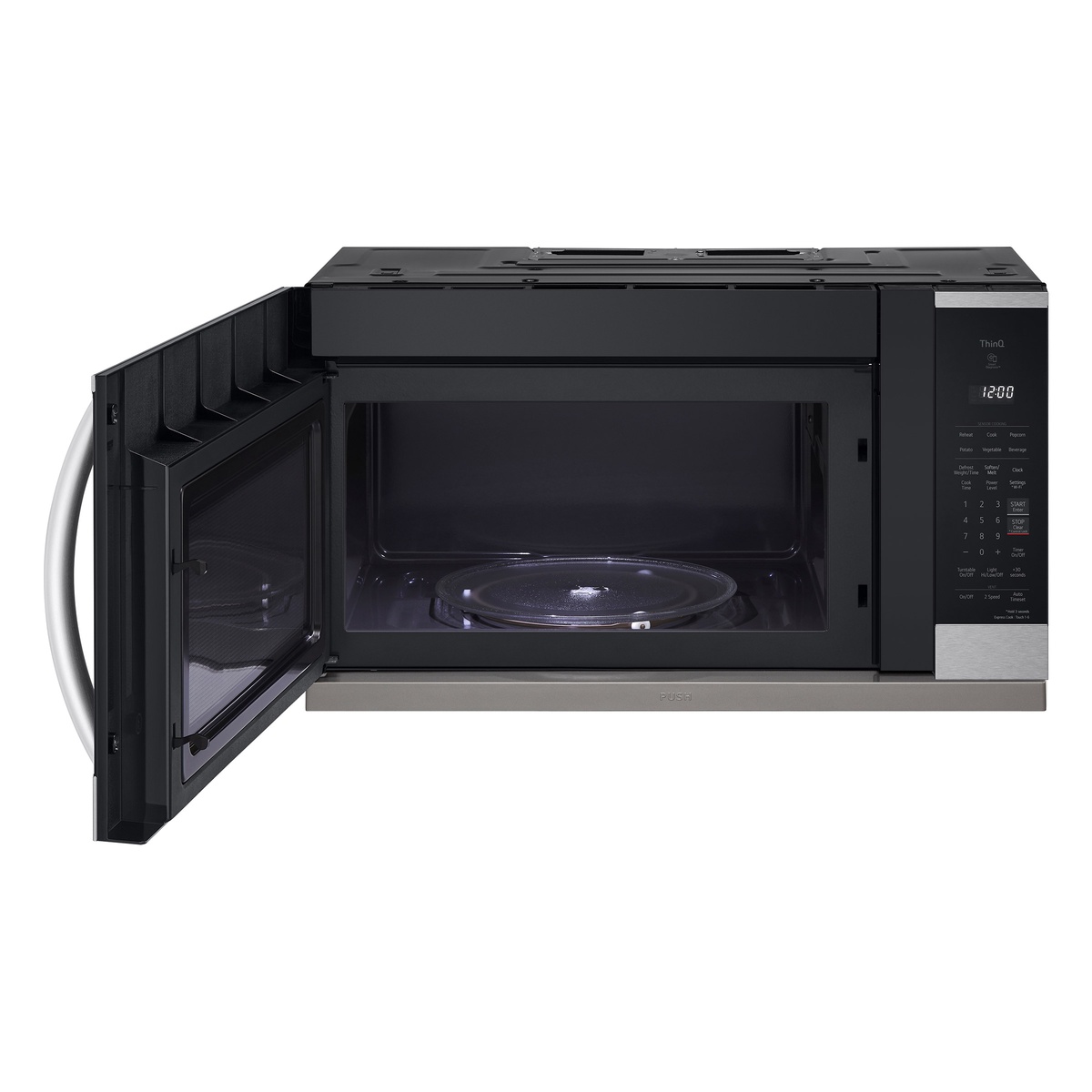 LG over-the-range microwave shown with door open revealing spacious interior and glass turntable