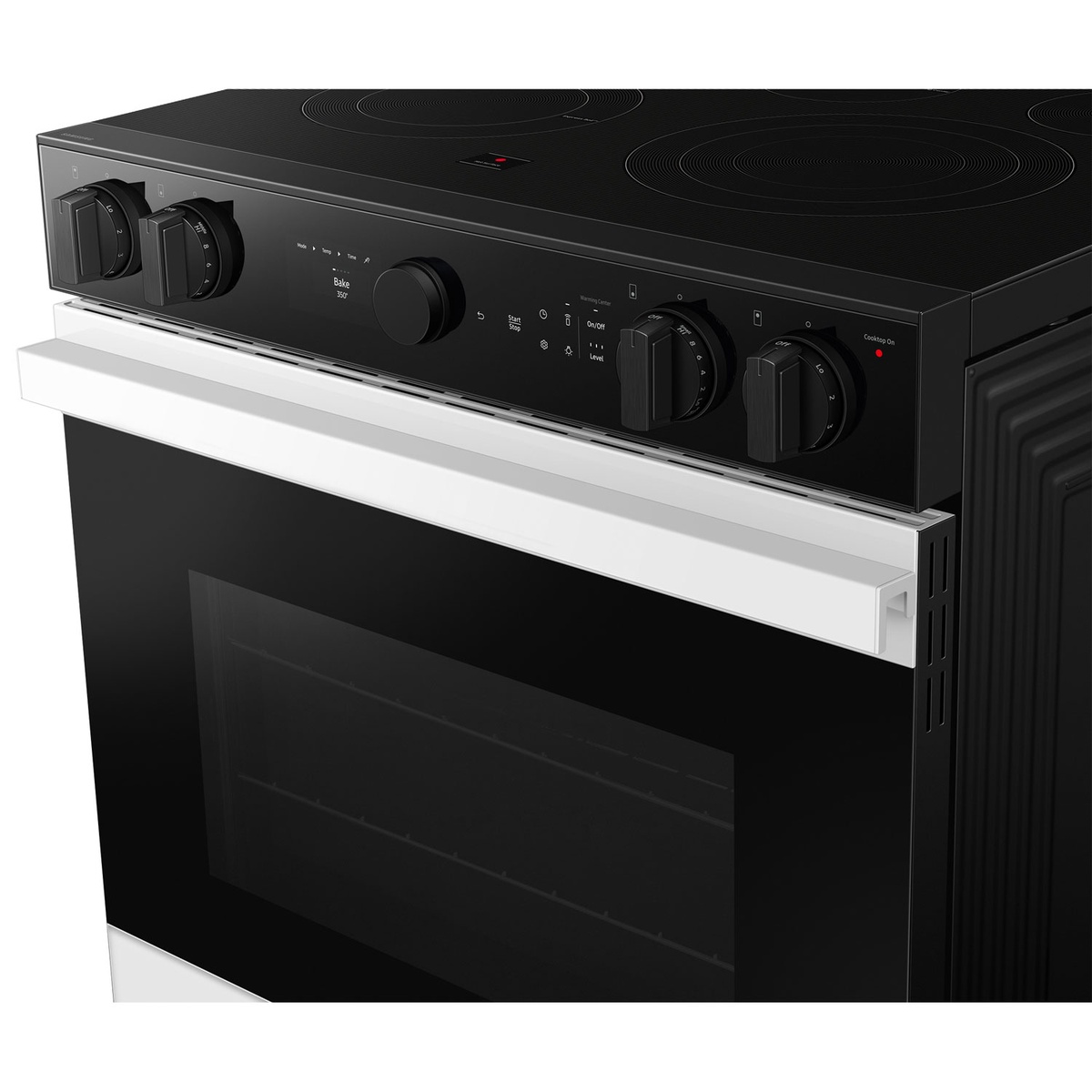 Close-up of front controls with glass touch display and knob dials on the slide-in range.