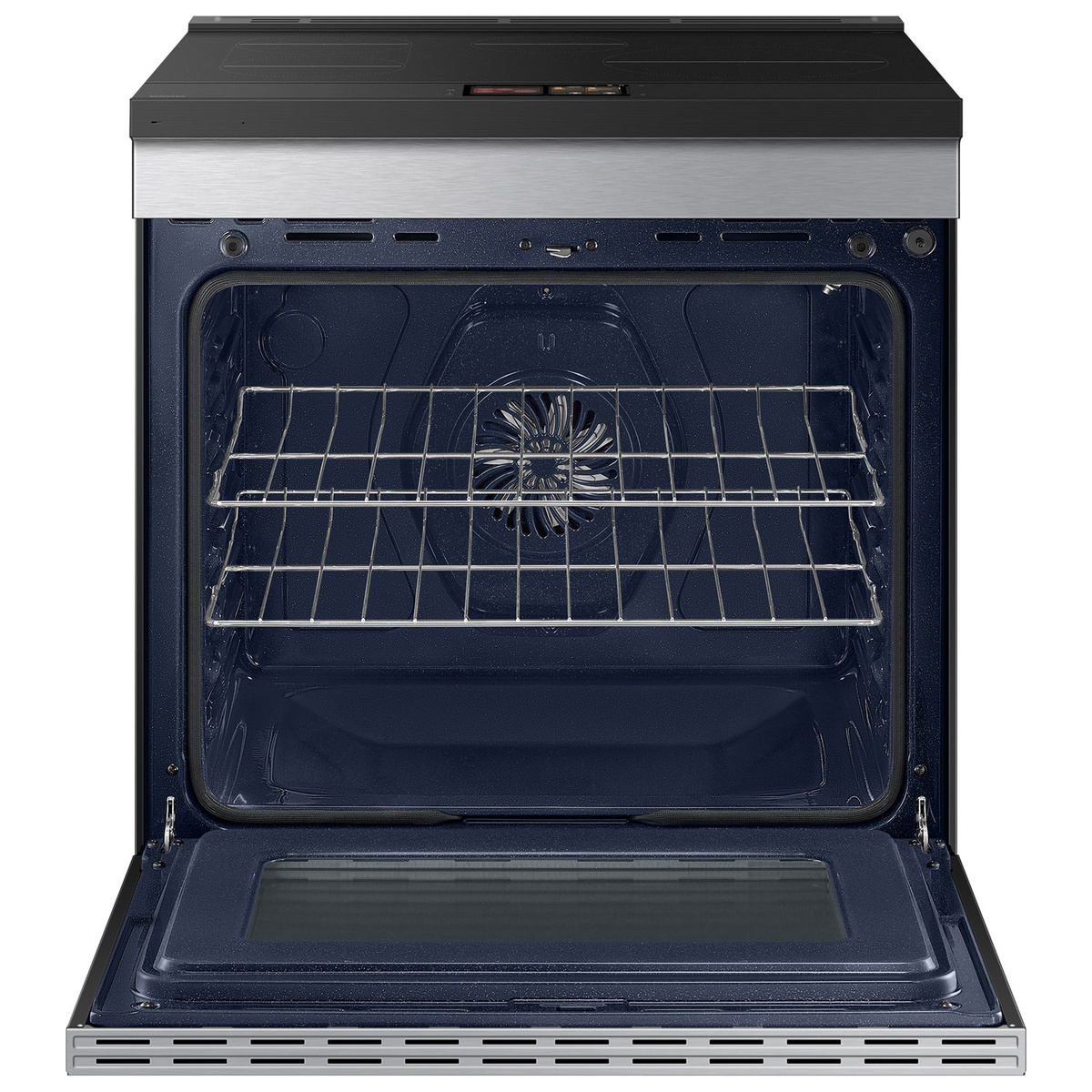 Open oven showing spacious interior with convection fan and two racks