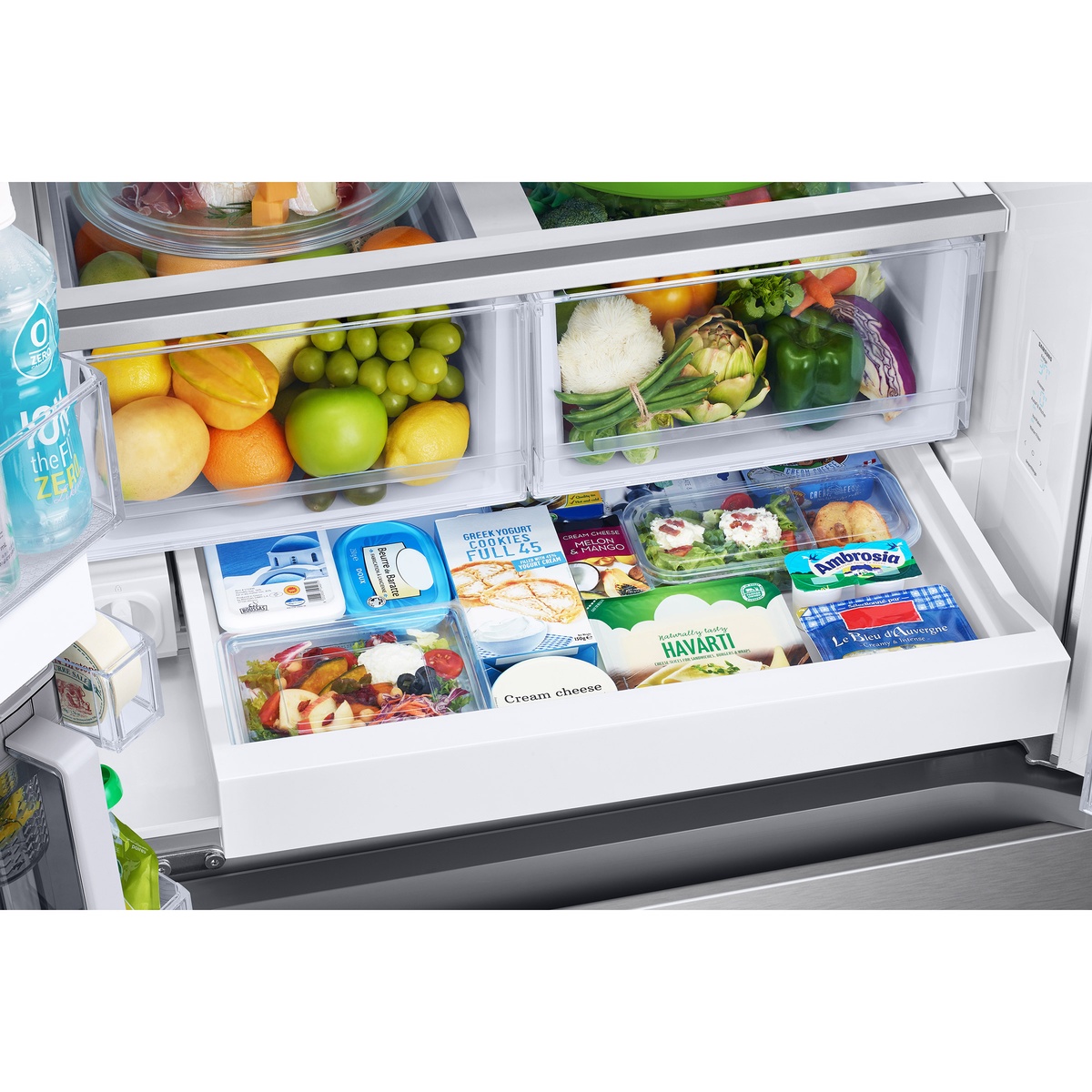 Wide crisper drawers and full-width pantry drawer loaded with fresh food