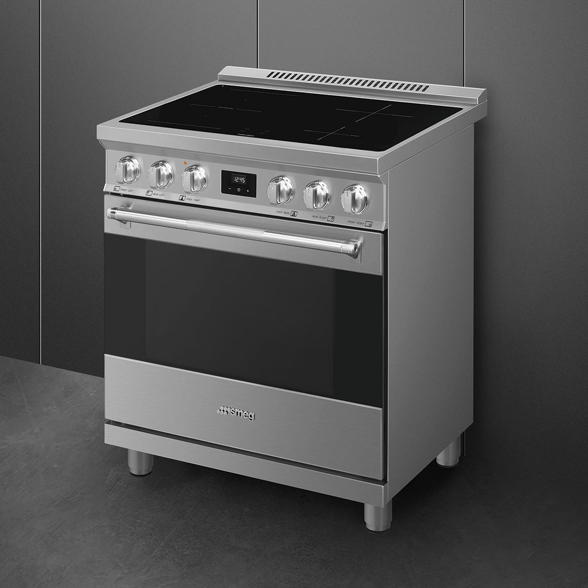 Angled view of the stainless Smeg range showing pro-style knobs and handle.