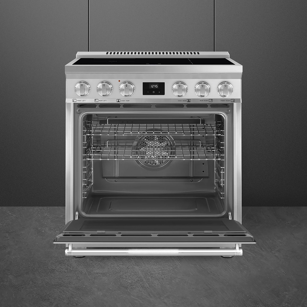 Open oven cavity of SPR30UIMX with fan at back and multiple rack positions.