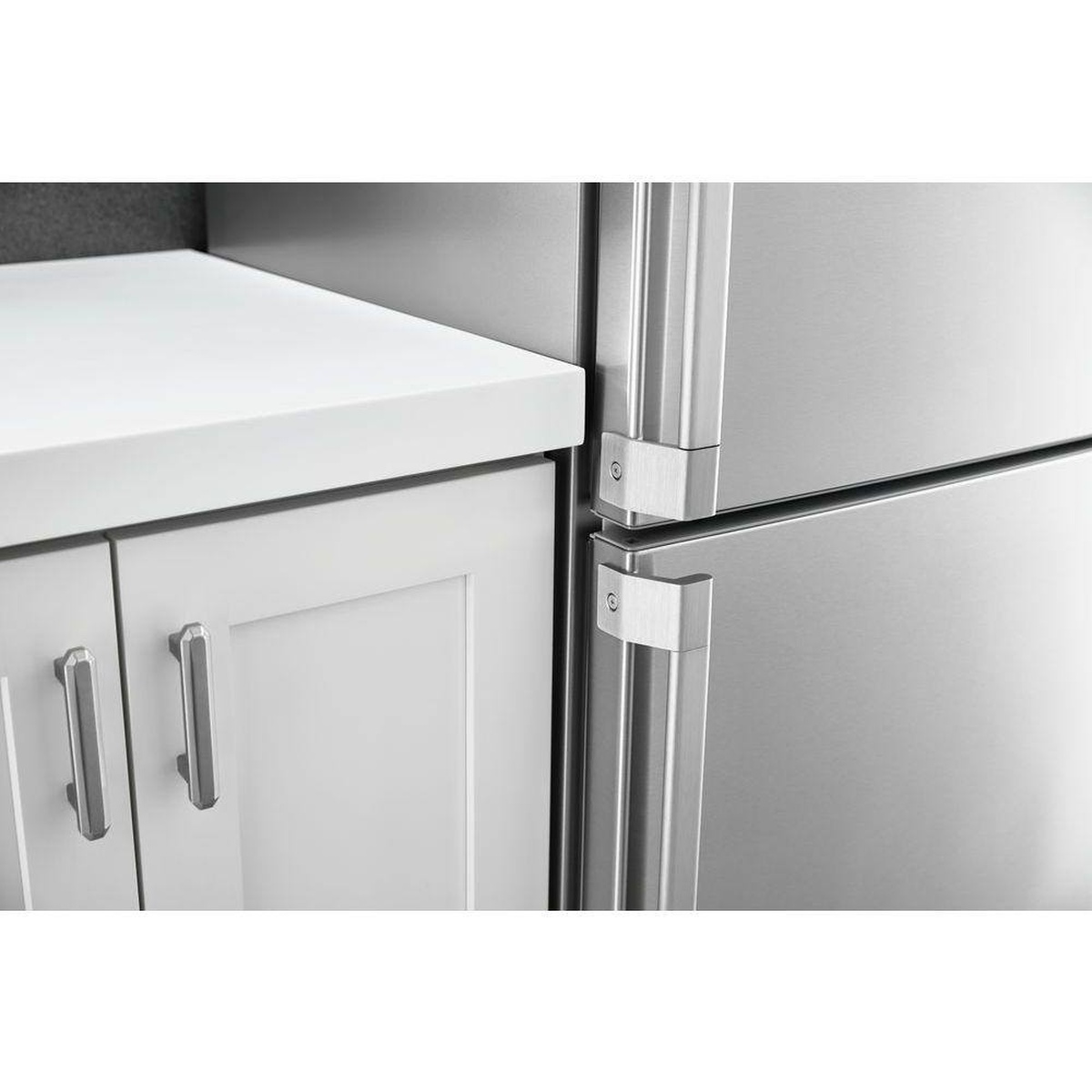 Counter-depth refrigerator shown nearly flush with surrounding countertop and cabinetry