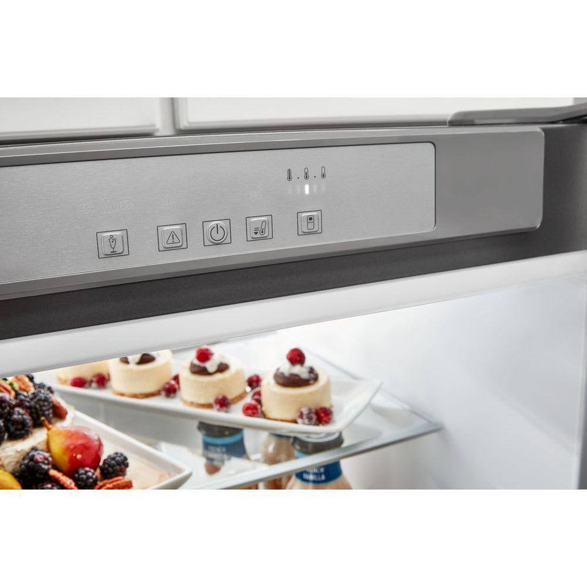 Close-up of cabinet-edge electronic controls inside the refrigerator