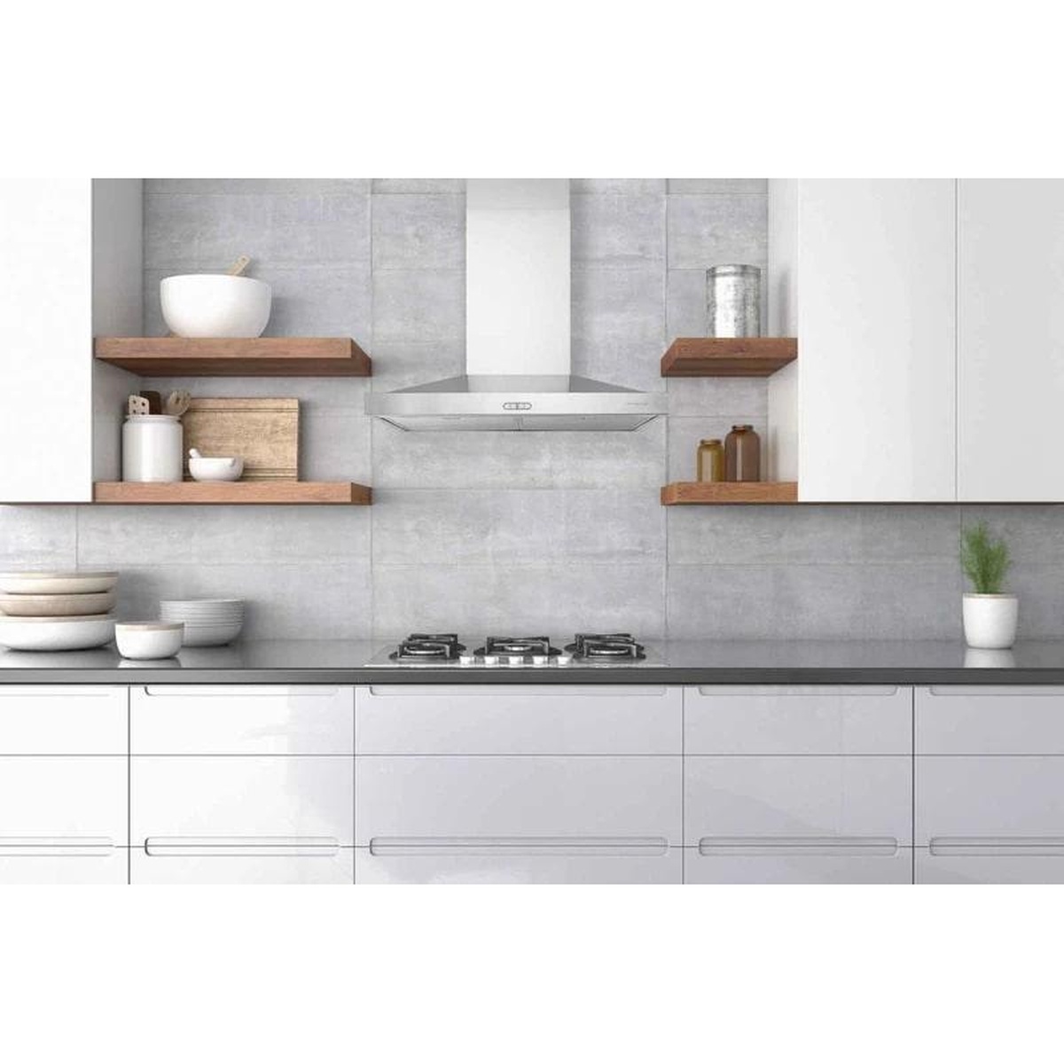Stainless steel chimney range hood installed above a cooktop in a modern kitchen
